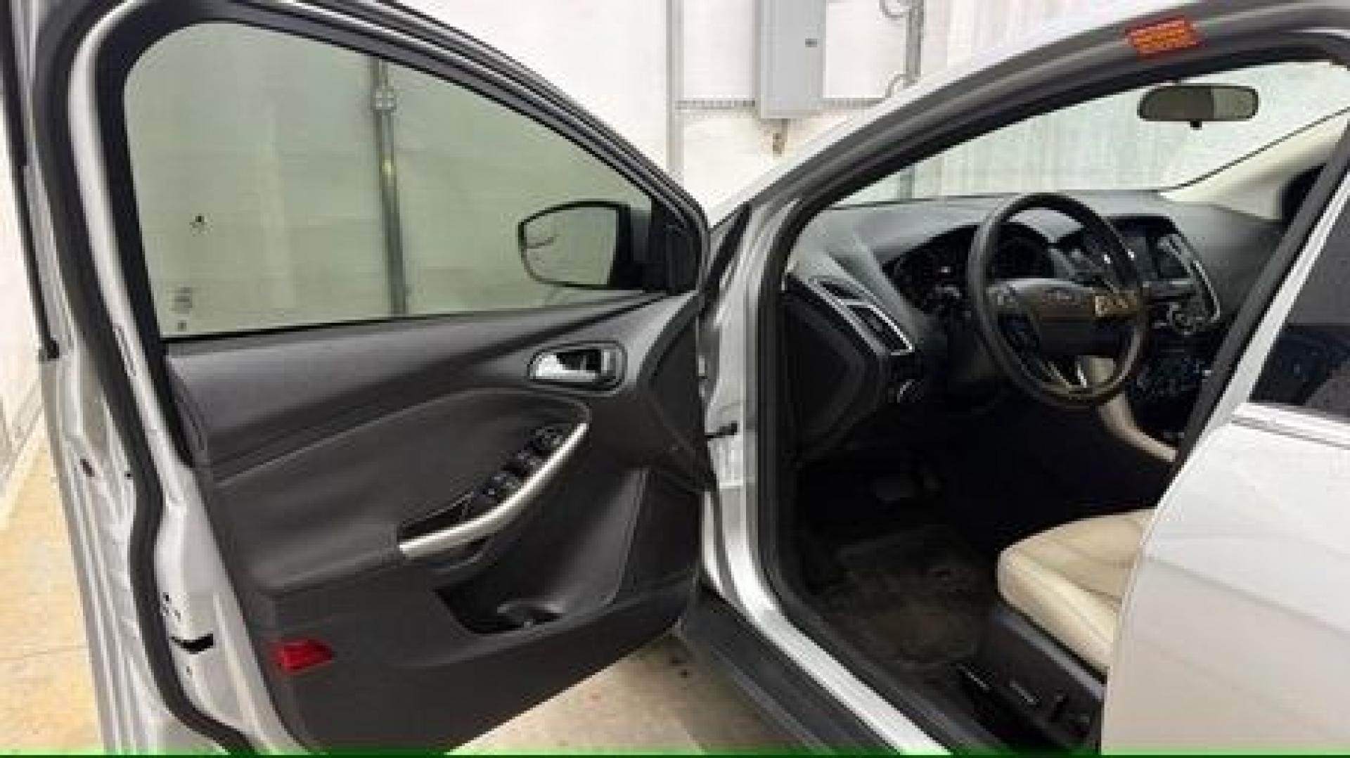 2018 Silver Ford Focus Titanium (1FADP3N20JL) with an 2L I-4 gasoline direct injection engine, located at 1806 Veterans Memorial Hwy SW, Austell, GA, 30168, (770) 944-9558, 33.817959, -84.606987- Photo#10