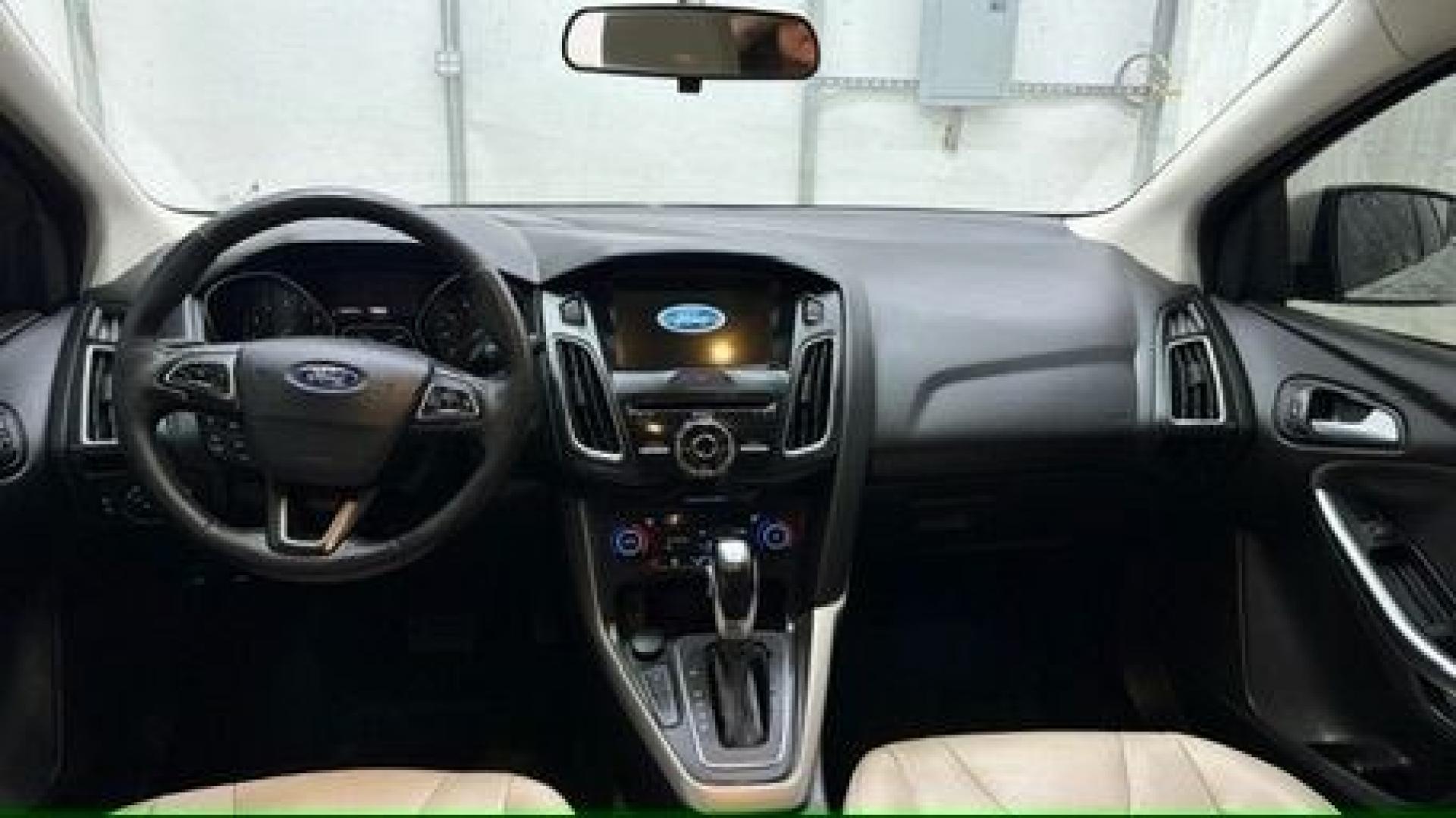 2018 Silver Ford Focus Titanium (1FADP3N20JL) with an 2L I-4 gasoline direct injection engine, located at 1806 Veterans Memorial Hwy SW, Austell, GA, 30168, (770) 944-9558, 33.817959, -84.606987- Photo#15