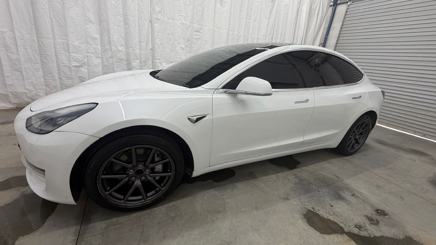 2019 White Tesla Model 3 Mid Range (5YJ3E1EA3KF) with an ELECTRIC engine, 1-Speed Automatic transmission, located at 1806 Veterans Memorial Hwy SW, Austell, GA, 30168, (770) 944-9558, 33.817959, -84.606987 - This 2019 Tesla Model 3 Mid Range RWD is a two-owner vehicle that has passed a 100+ point inspection performed in our own service center. The interior is in great condition, with no odors, no tears, and no fading. The exterior looks great, and the vehicle has been repainted overall. Please note that- Photo#1