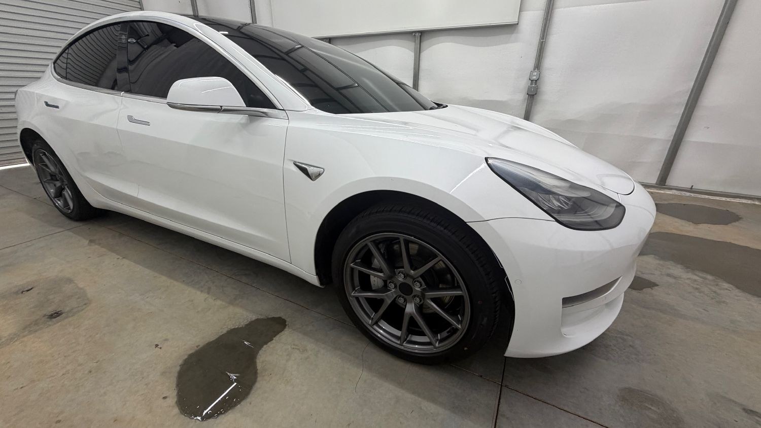 2019 White Tesla Model 3 Mid Range (5YJ3E1EA3KF) with an ELECTRIC engine, 1-Speed Automatic transmission, located at 1806 Veterans Memorial Hwy SW, Austell, GA, 30168, (770) 944-9558, 33.817959, -84.606987 - This 2019 Tesla Model 3 Mid Range RWD is a two-owner vehicle that has passed a 100+ point inspection performed in our own service center. The interior is in great condition, with no odors, no tears, and no fading. The exterior looks great, and the vehicle has been repainted overall. Please note that- Photo#7