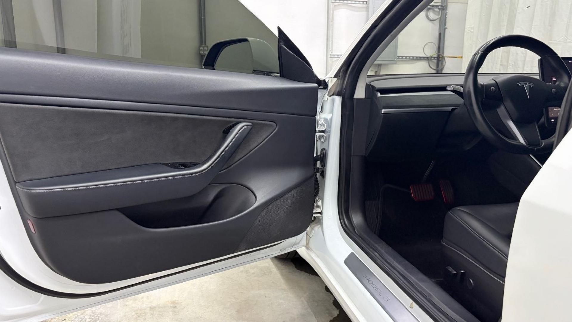 2019 White Tesla Model 3 Mid Range (5YJ3E1EA3KF) with an ELECTRIC engine, 1-Speed Automatic transmission, located at 1806 Veterans Memorial Hwy SW, Austell, GA, 30168, (770) 944-9558, 33.817959, -84.606987 - Why Choose Automania? At Automania, we make car buying easy and stress-free, with over 20 years serving Austell, GA and the surrounding communities. WE FINANCE GOOD AND NOT SO GOOD CREDIT, we work with all credit types, and every vehicle comes with a free vehicle history report so you know its backg- Photo#10