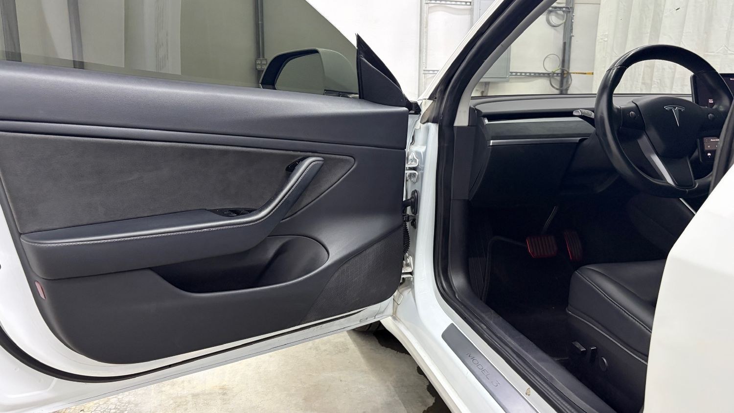 2019 White Tesla Model 3 Mid Range (5YJ3E1EA3KF) with an ELECTRIC engine, 1-Speed Automatic transmission, located at 1806 Veterans Memorial Hwy SW, Austell, GA, 30168, (770) 944-9558, 33.817959, -84.606987 - This 2019 Tesla Model 3 Mid Range RWD is a two-owner vehicle that has passed a 100+ point inspection performed in our own service center. The interior is in great condition, with no odors, no tears, and no fading. The exterior looks great, and the vehicle has been repainted overall. Please note that- Photo#10