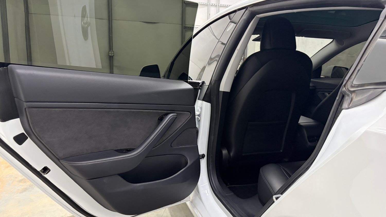 2019 White Tesla Model 3 Mid Range (5YJ3E1EA3KF) with an ELECTRIC engine, 1-Speed Automatic transmission, located at 1806 Veterans Memorial Hwy SW, Austell, GA, 30168, (770) 944-9558, 33.817959, -84.606987 - This 2019 Tesla Model 3 Mid Range RWD is a two-owner vehicle that has passed a 100+ point inspection performed in our own service center. The interior is in great condition, with no odors, no tears, and no fading. The exterior looks great, and the vehicle has been repainted overall. Please note that- Photo#12