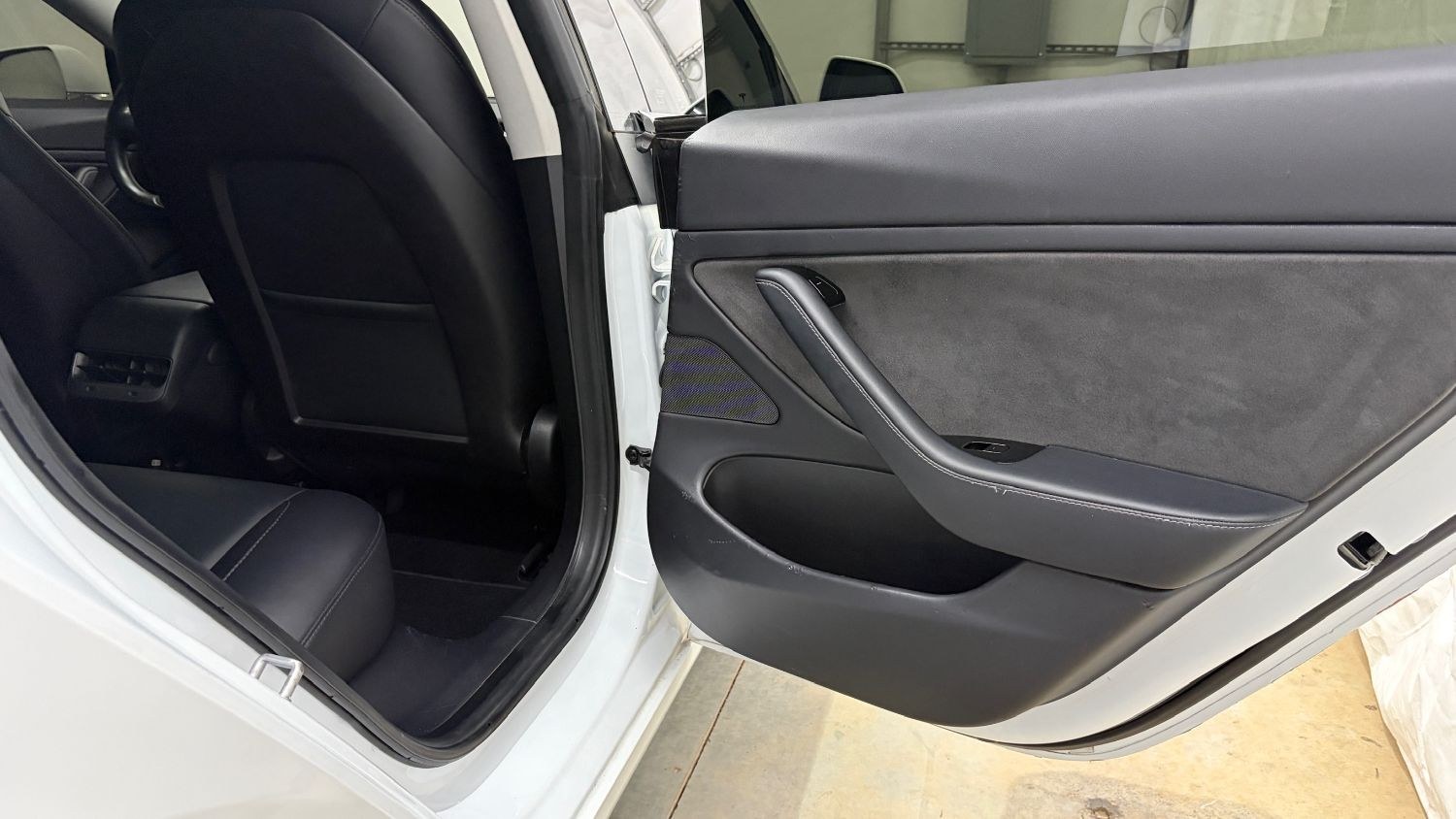 2019 White Tesla Model 3 Mid Range (5YJ3E1EA3KF) with an ELECTRIC engine, 1-Speed Automatic transmission, located at 1806 Veterans Memorial Hwy SW, Austell, GA, 30168, (770) 944-9558, 33.817959, -84.606987 - This 2019 Tesla Model 3 Mid Range RWD is a two-owner vehicle that has passed a 100+ point inspection performed in our own service center. The interior is in great condition, with no odors, no tears, and no fading. The exterior looks great, and the vehicle has been repainted overall. Please note that- Photo#16