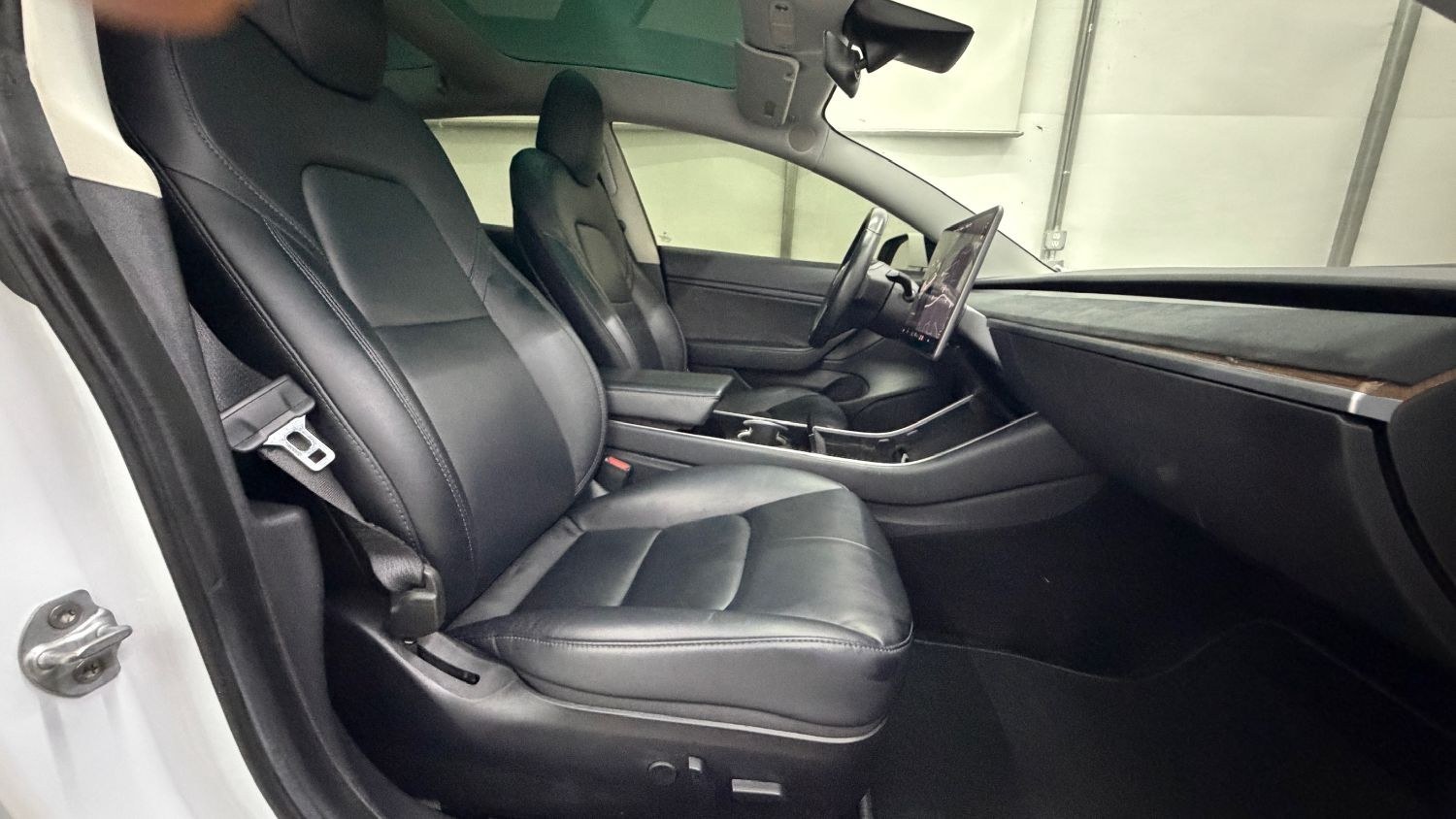 2019 White Tesla Model 3 Mid Range (5YJ3E1EA3KF) with an ELECTRIC engine, 1-Speed Automatic transmission, located at 1806 Veterans Memorial Hwy SW, Austell, GA, 30168, (770) 944-9558, 33.817959, -84.606987 - This 2019 Tesla Model 3 Mid Range RWD is a two-owner vehicle that has passed a 100+ point inspection performed in our own service center. The interior is in great condition, with no odors, no tears, and no fading. The exterior looks great, and the vehicle has been repainted overall. Please note that- Photo#19