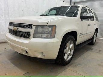 2011 White Chevrolet Tahoe LTZ (1GNSCCE05BR) with an Vortec 5.3L V-8 variable valve control engine, located at 1806 Veterans Memorial Hwy SW, Austell, GA, 30168, (770) 944-9558, 33.817959, -84.606987- Photo#0