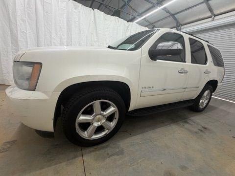 2011 White Chevrolet Tahoe LTZ (1GNSCCE05BR) with an Vortec 5.3L V-8 variable valve control engine, located at 1806 Veterans Memorial Hwy SW, Austell, GA, 30168, (770) 944-9558, 33.817959, -84.606987- Photo#1