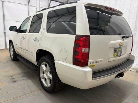 2011 White Chevrolet Tahoe LTZ (1GNSCCE05BR) with an Vortec 5.3L V-8 variable valve control engine, located at 1806 Veterans Memorial Hwy SW, Austell, GA, 30168, (770) 944-9558, 33.817959, -84.606987- Photo#3