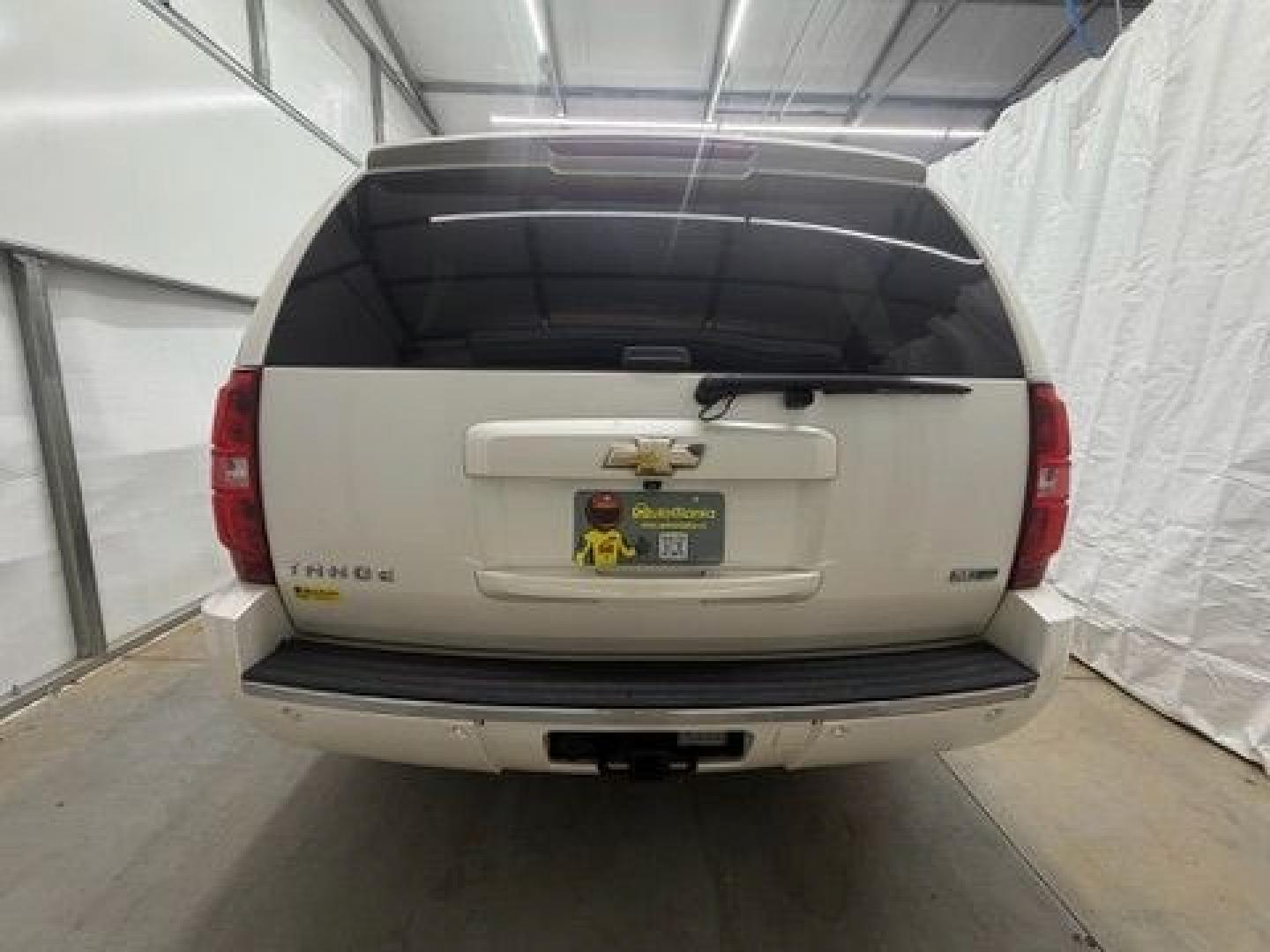 2011 White Chevrolet Tahoe LTZ (1GNSCCE05BR) with an Vortec 5.3L V-8 variable valve control engine, located at 1806 Veterans Memorial Hwy SW, Austell, GA, 30168, (770) 944-9558, 33.817959, -84.606987- Photo#4
