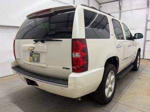 2011 White Chevrolet Tahoe LTZ (1GNSCCE05BR) with an Vortec 5.3L V-8 variable valve control engine, located at 1806 Veterans Memorial Hwy SW, Austell, GA, 30168, (770) 944-9558, 33.817959, -84.606987- Photo#5