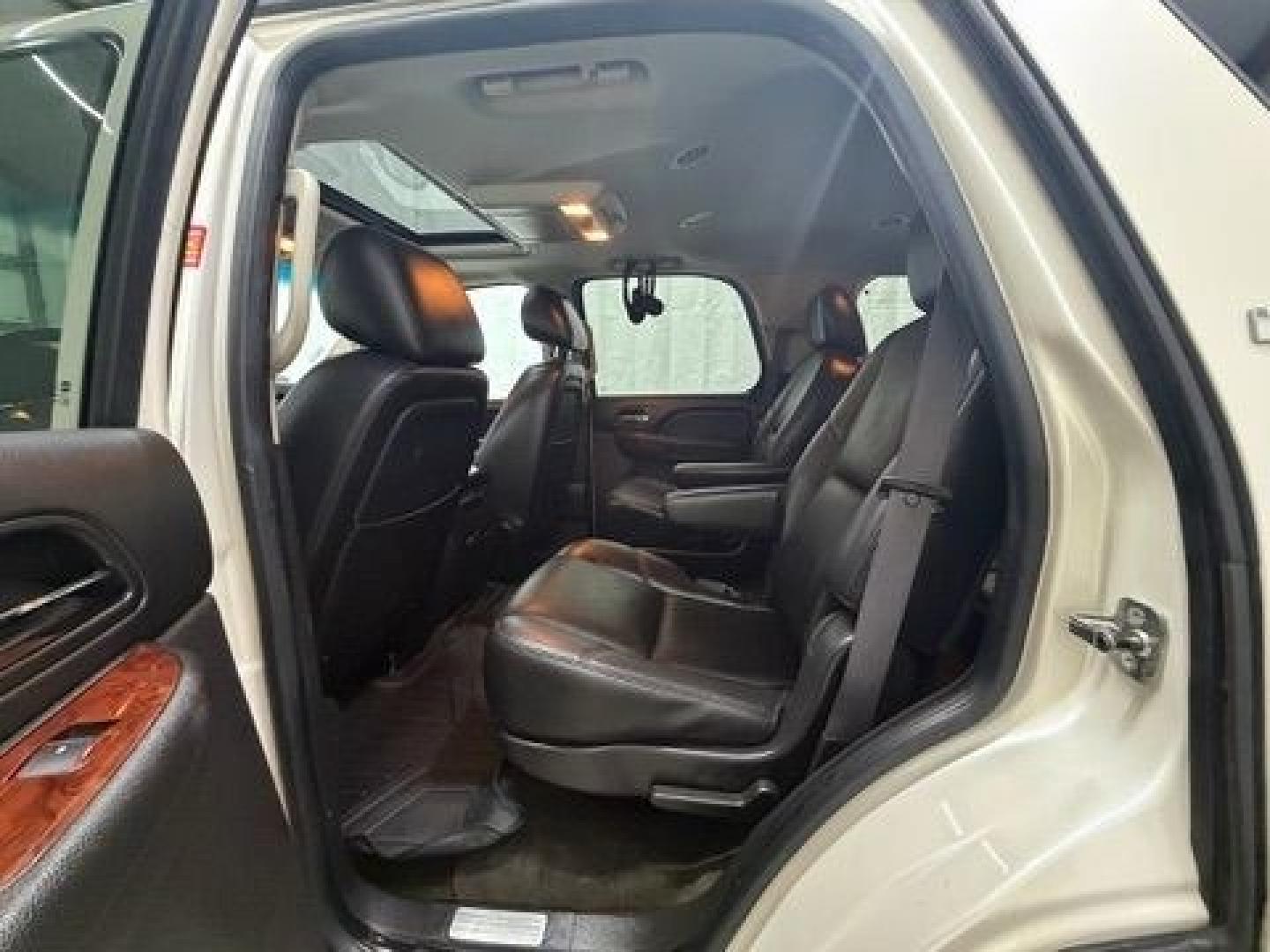 2011 White Chevrolet Tahoe LTZ (1GNSCCE05BR) with an Vortec 5.3L V-8 variable valve control engine, located at 1806 Veterans Memorial Hwy SW, Austell, GA, 30168, (770) 944-9558, 33.817959, -84.606987- Photo#9
