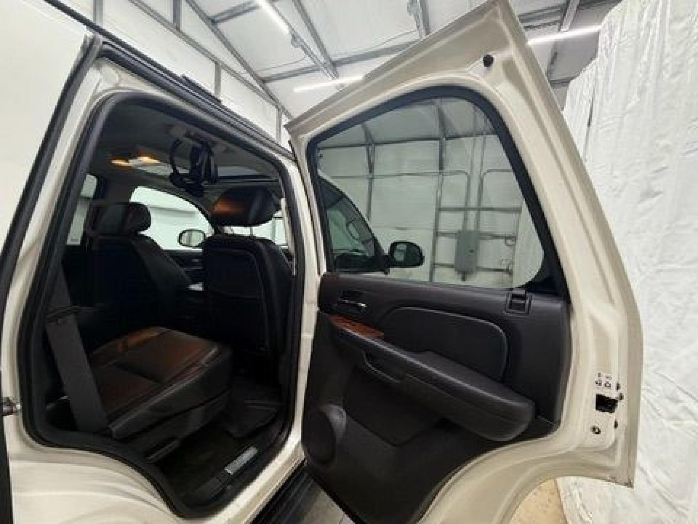 2011 White Chevrolet Tahoe LTZ (1GNSCCE05BR) with an Vortec 5.3L V-8 variable valve control engine, located at 1806 Veterans Memorial Hwy SW, Austell, GA, 30168, (770) 944-9558, 33.817959, -84.606987- Photo#11