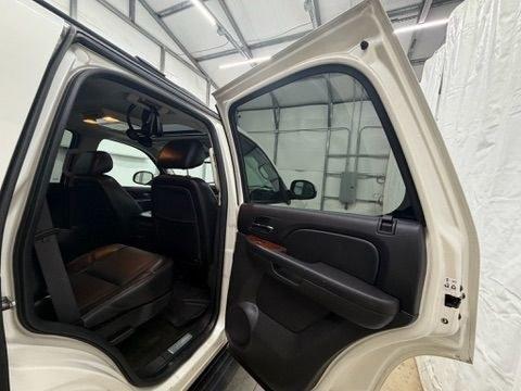 2011 White Chevrolet Tahoe LTZ (1GNSCCE05BR) with an Vortec 5.3L V-8 variable valve control engine, located at 1806 Veterans Memorial Hwy SW, Austell, GA, 30168, (770) 944-9558, 33.817959, -84.606987- Photo#11