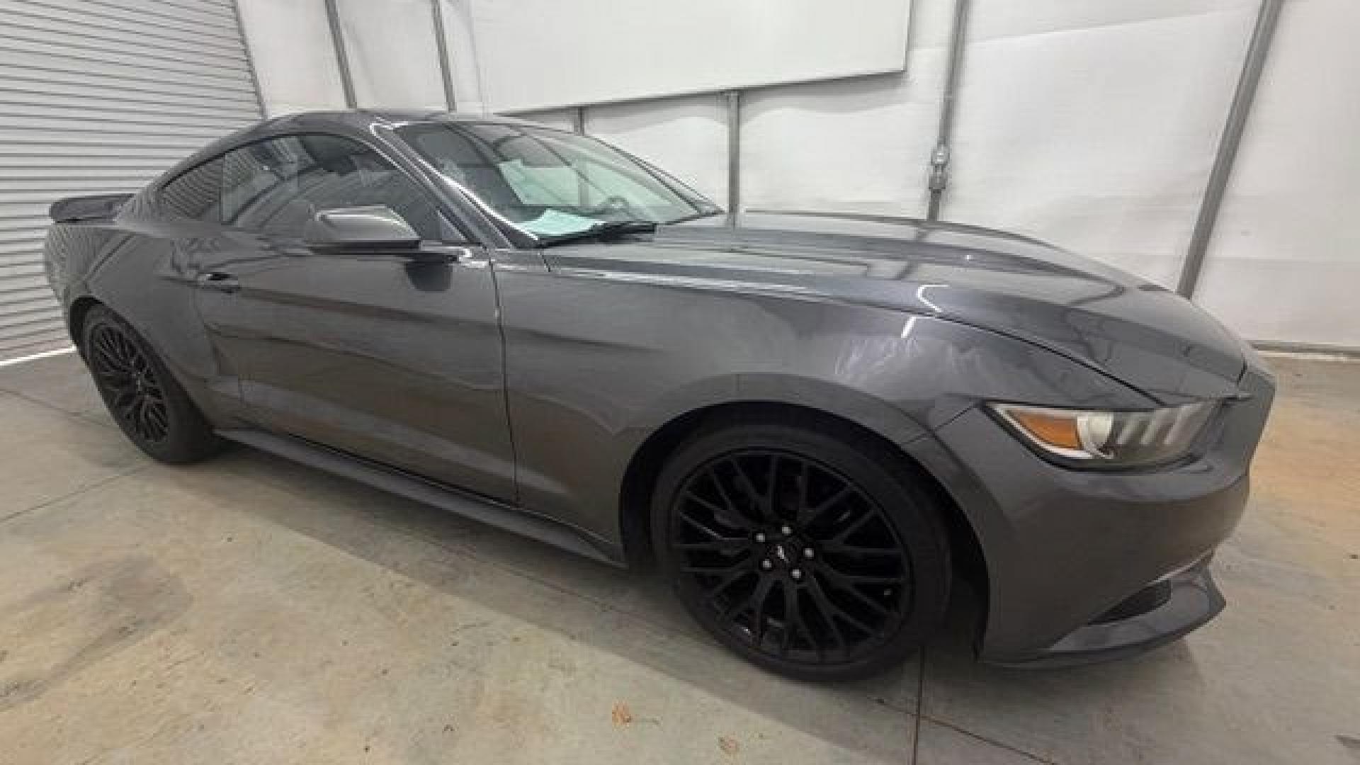 2017 Gray Ford Mustang EcoBoost (1FA6P8TH0H5) with an EcoBoost 2.3L I-4 gasoline direct injection engine, located at 1806 Veterans Memorial Hwy SW, Austell, GA, 30168, (770) 944-9558, 33.817959, -84.606987 - Why Choose Automania? At Automania, we make car buying easy and stress-free, with over 20 years serving Austell, GA and the surrounding communities. WE FINANCE GOOD AND NOT SO GOOD CREDIT, we work with all credit types, and every vehicle comes with a free vehicle history report so you know its backg- Photo#7