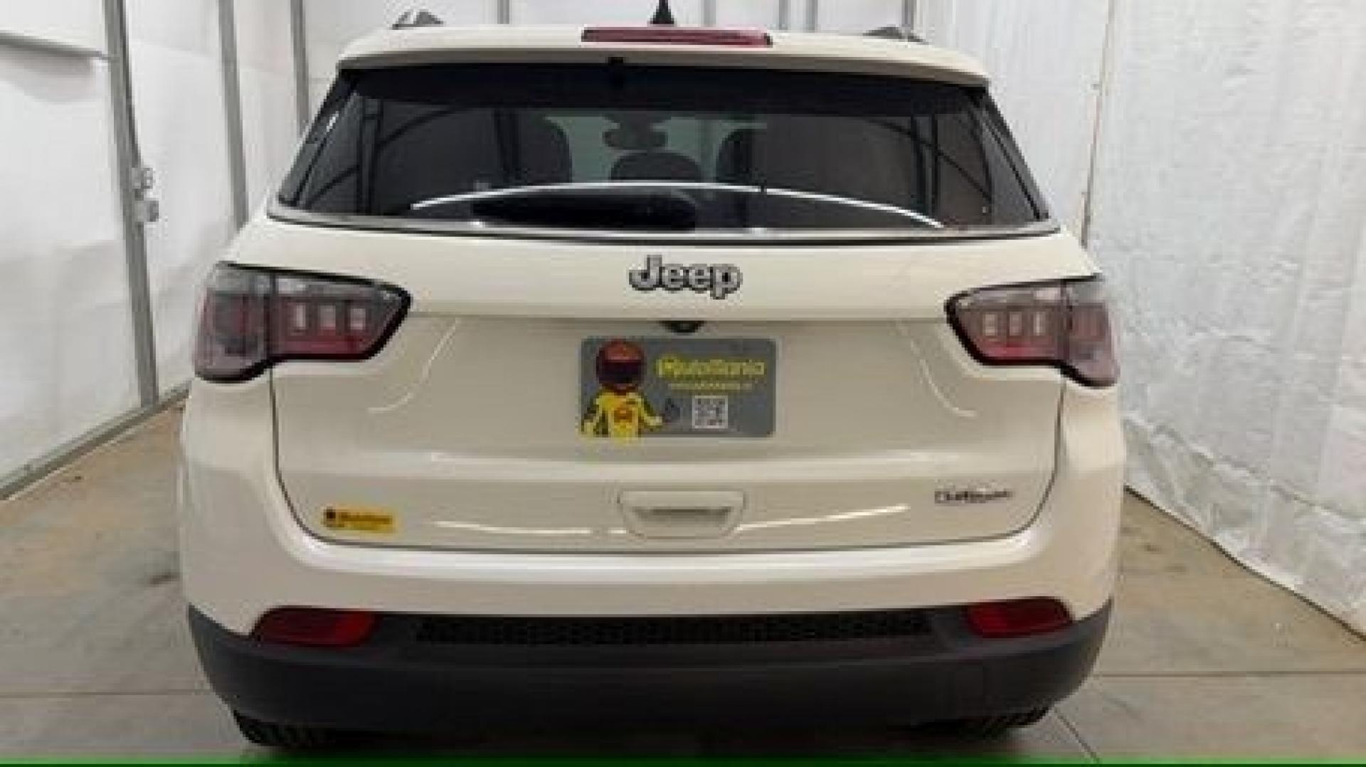 2021 White Jeep Compass Latitude FWD (3C4NJCBB2MT) with an 2.4L I-4 variable valve control engine, located at 1806 Veterans Memorial Hwy SW, Austell, GA, 30168, (770) 944-9558, 33.817959, -84.606987 - This Jeep looks good and is in good condition overall. The tires are in good shape, and the interior is impeccable. A modern, practical compact SUV that's ready for daily driving.- Photo#4