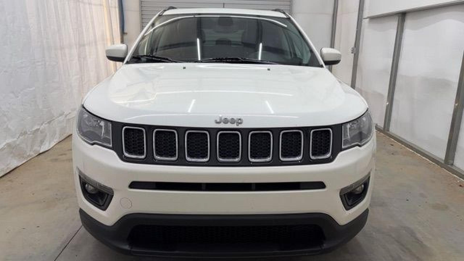 2021 White Jeep Compass Latitude FWD (3C4NJCBB2MT) with an 2.4L I-4 variable valve control engine, located at 1806 Veterans Memorial Hwy SW, Austell, GA, 30168, (770) 944-9558, 33.817959, -84.606987 - This Jeep looks good and is in good condition overall. The tires are in good shape, and the interior is impeccable. A modern, practical compact SUV that's ready for daily driving.- Photo#10