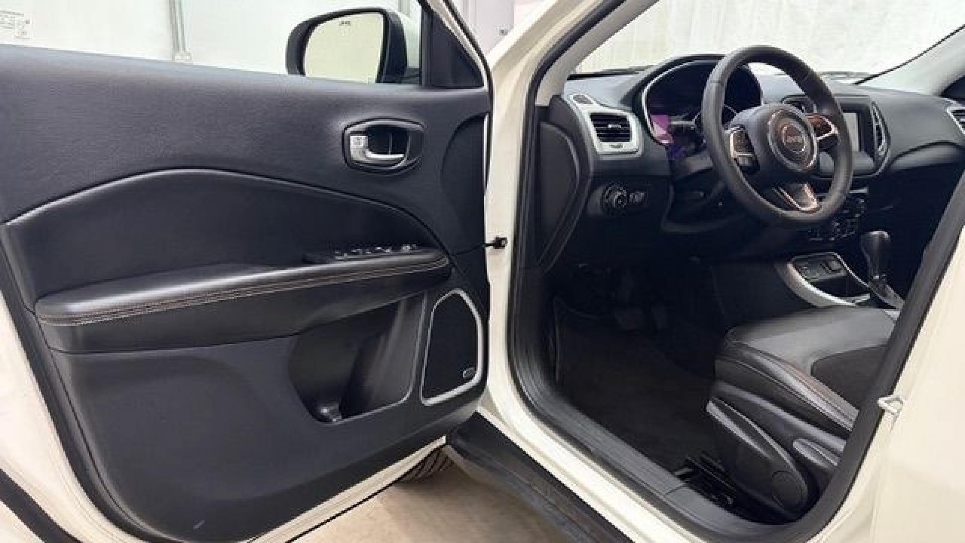 2021 White Jeep Compass Latitude FWD (3C4NJCBB2MT) with an 2.4L I-4 variable valve control engine, located at 1806 Veterans Memorial Hwy SW, Austell, GA, 30168, (770) 944-9558, 33.817959, -84.606987 - This Jeep looks good and is in good condition overall. The tires are in good shape, and the interior is impeccable. A modern, practical compact SUV that's ready for daily driving.- Photo#11
