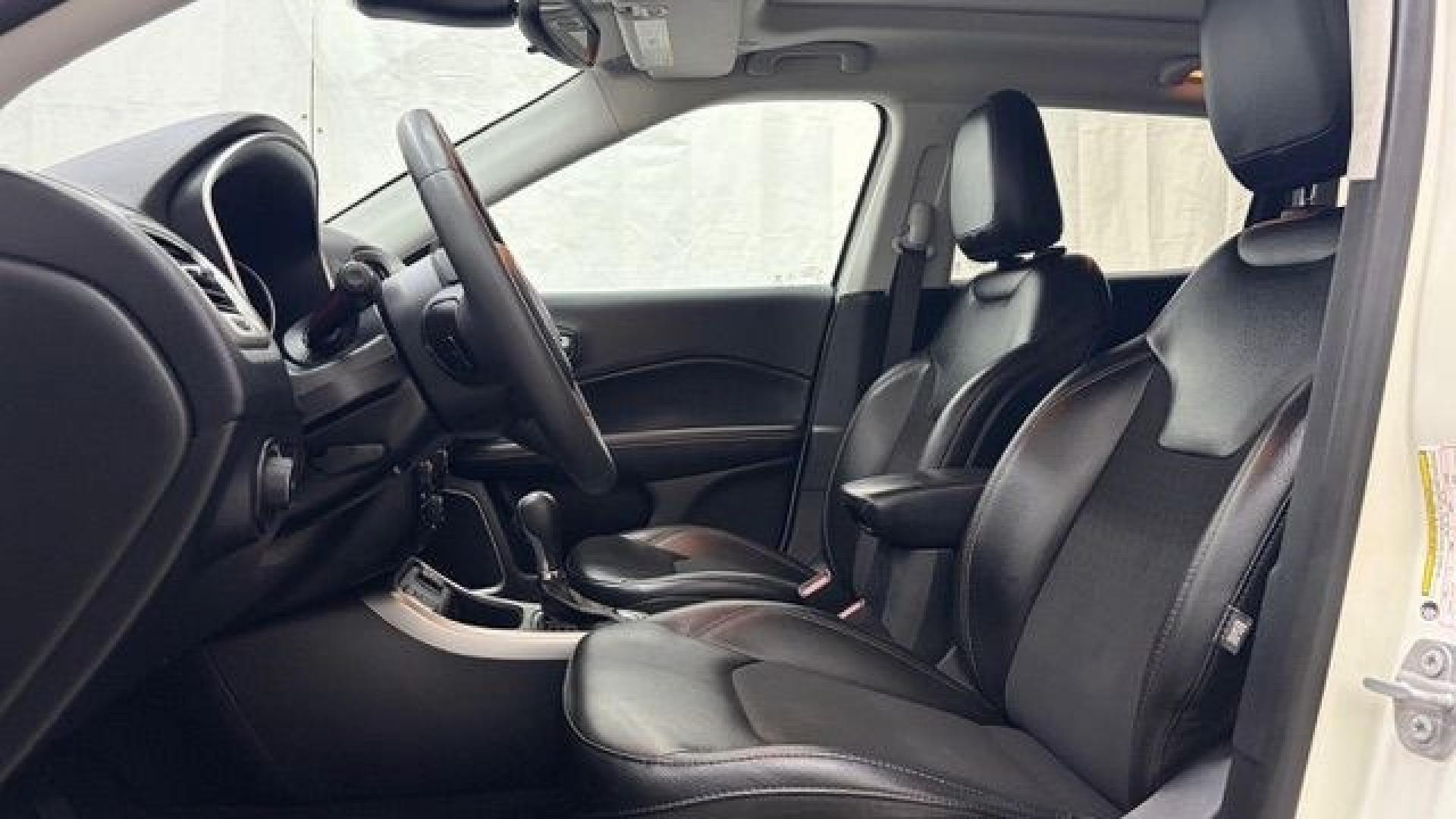 2021 White Jeep Compass Latitude FWD (3C4NJCBB2MT) with an 2.4L I-4 variable valve control engine, located at 1806 Veterans Memorial Hwy SW, Austell, GA, 30168, (770) 944-9558, 33.817959, -84.606987 - This Jeep looks good and is in good condition overall. The tires are in good shape, and the interior is impeccable. A modern, practical compact SUV that's ready for daily driving.- Photo#12