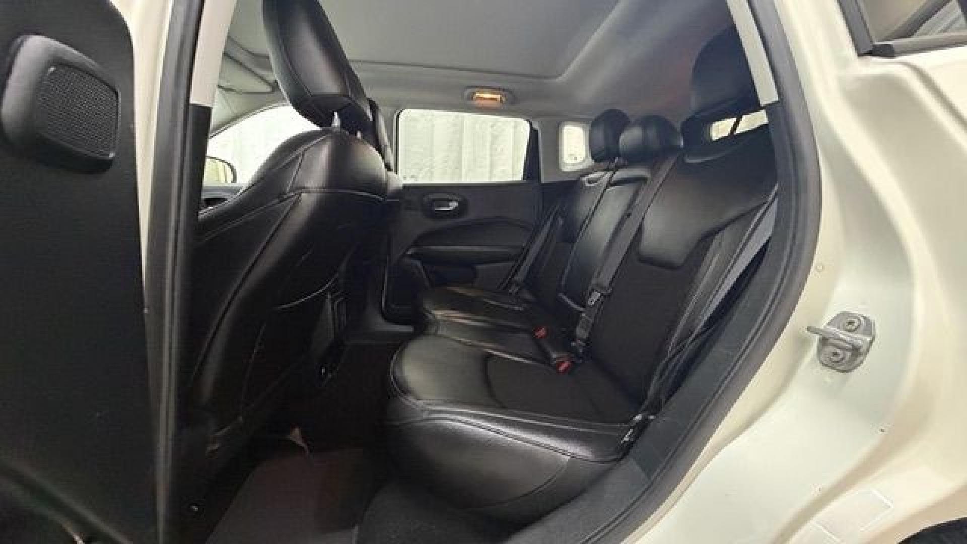 2021 White Jeep Compass Latitude FWD (3C4NJCBB2MT) with an 2.4L I-4 variable valve control engine, located at 1806 Veterans Memorial Hwy SW, Austell, GA, 30168, (770) 944-9558, 33.817959, -84.606987 - This Jeep looks good and is in good condition overall. The tires are in good shape, and the interior is impeccable. A modern, practical compact SUV that's ready for daily driving.- Photo#15