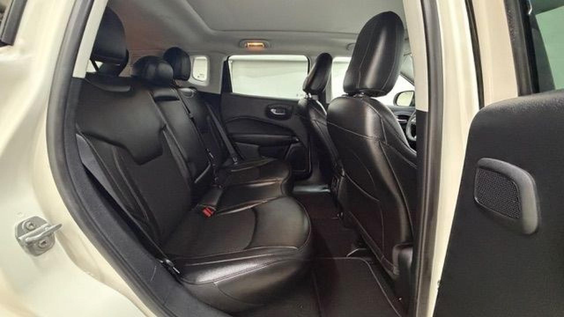 2021 White Jeep Compass Latitude FWD (3C4NJCBB2MT) with an 2.4L I-4 variable valve control engine, located at 1806 Veterans Memorial Hwy SW, Austell, GA, 30168, (770) 944-9558, 33.817959, -84.606987 - This Jeep looks good and is in good condition overall. The tires are in good shape, and the interior is impeccable. A modern, practical compact SUV that's ready for daily driving.- Photo#17