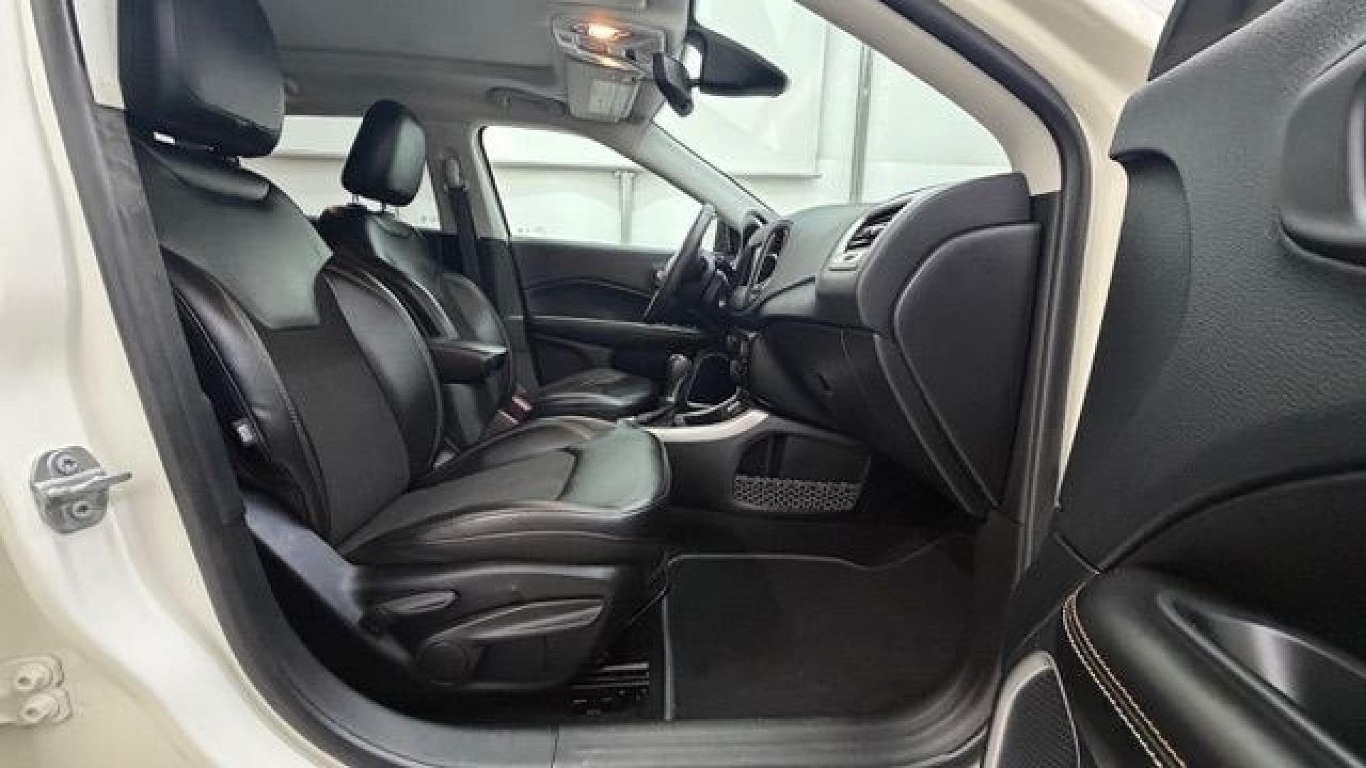 2021 White Jeep Compass Latitude FWD (3C4NJCBB2MT) with an 2.4L I-4 variable valve control engine, located at 1806 Veterans Memorial Hwy SW, Austell, GA, 30168, (770) 944-9558, 33.817959, -84.606987 - This Jeep looks good and is in good condition overall. The tires are in good shape, and the interior is impeccable. A modern, practical compact SUV that's ready for daily driving.- Photo#18