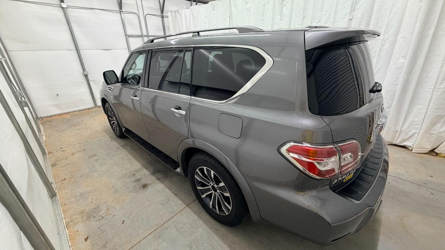 2020 Gray Nissan Armada SL 4WD (JN8AY2NC2LX) with an 5.6L V-8 gasoline direct injection engine, located at 1806 Veterans Memorial Hwy SW, Austell, GA, 30168, (770) 944-9558, 33.817959, -84.606987 - This 2020 Nissan Armada SL 4WD comes loaded with a powerful 390 hp 5.6L V8 engine and four-wheel drive, ready to handle everything from daily commutes to weekend trips with confidence. Inside, you'll find comfortable leather seating with heated seats, a navigation system, backup camera, adaptive cru- Photo#2