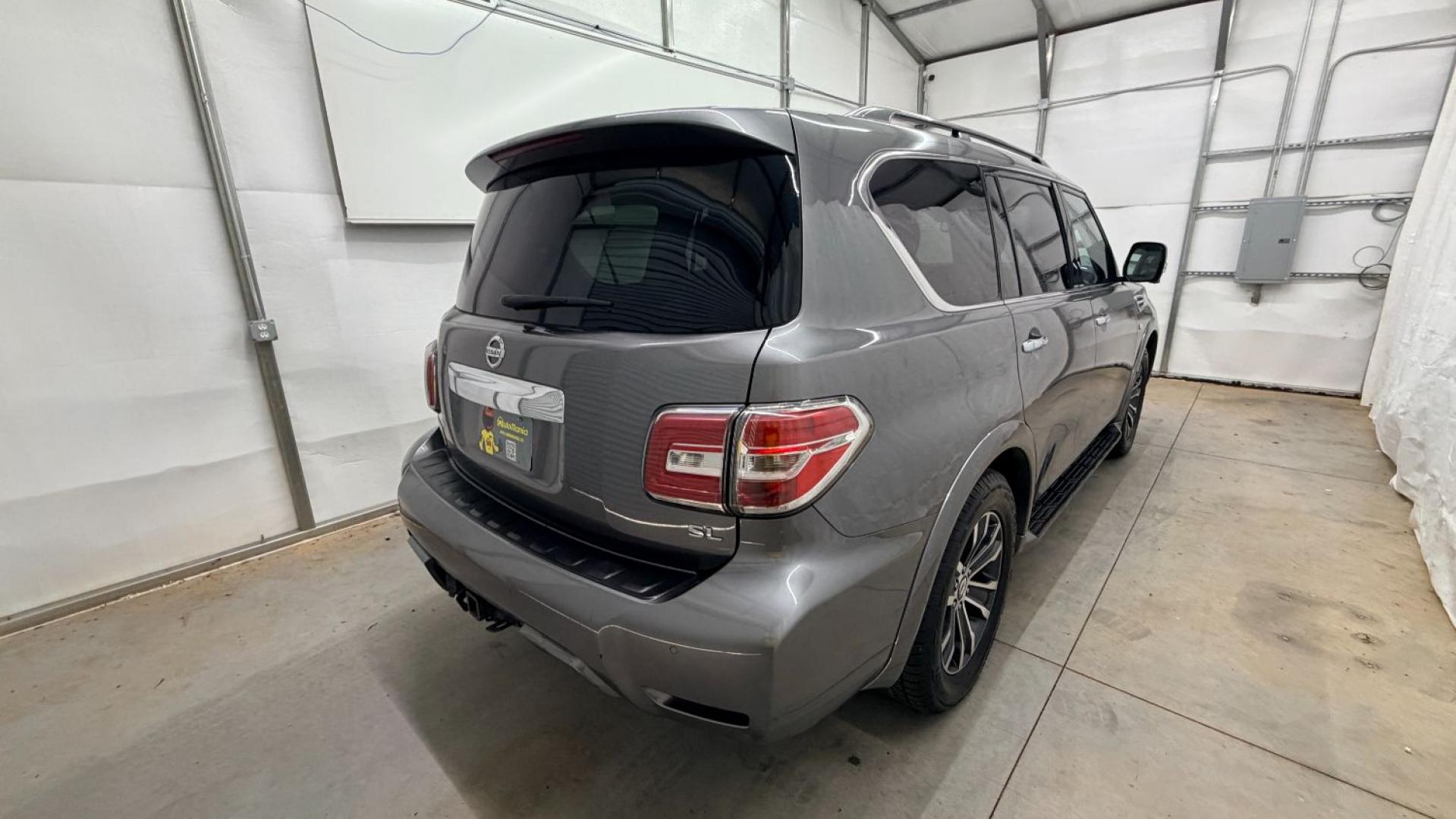 2020 Gray Nissan Armada SL 4WD (JN8AY2NC2LX) with an 5.6L V-8 gasoline direct injection engine, located at 1806 Veterans Memorial Hwy SW, Austell, GA, 30168, (770) 944-9558, 33.817959, -84.606987 - This 2020 Nissan Armada SL 4WD comes loaded with a powerful 390 hp 5.6L V8 engine and four-wheel drive, ready to handle everything from daily commutes to weekend trips with confidence. Inside, you'll find comfortable leather seating with heated seats, a navigation system, backup camera, adaptive cru- Photo#6