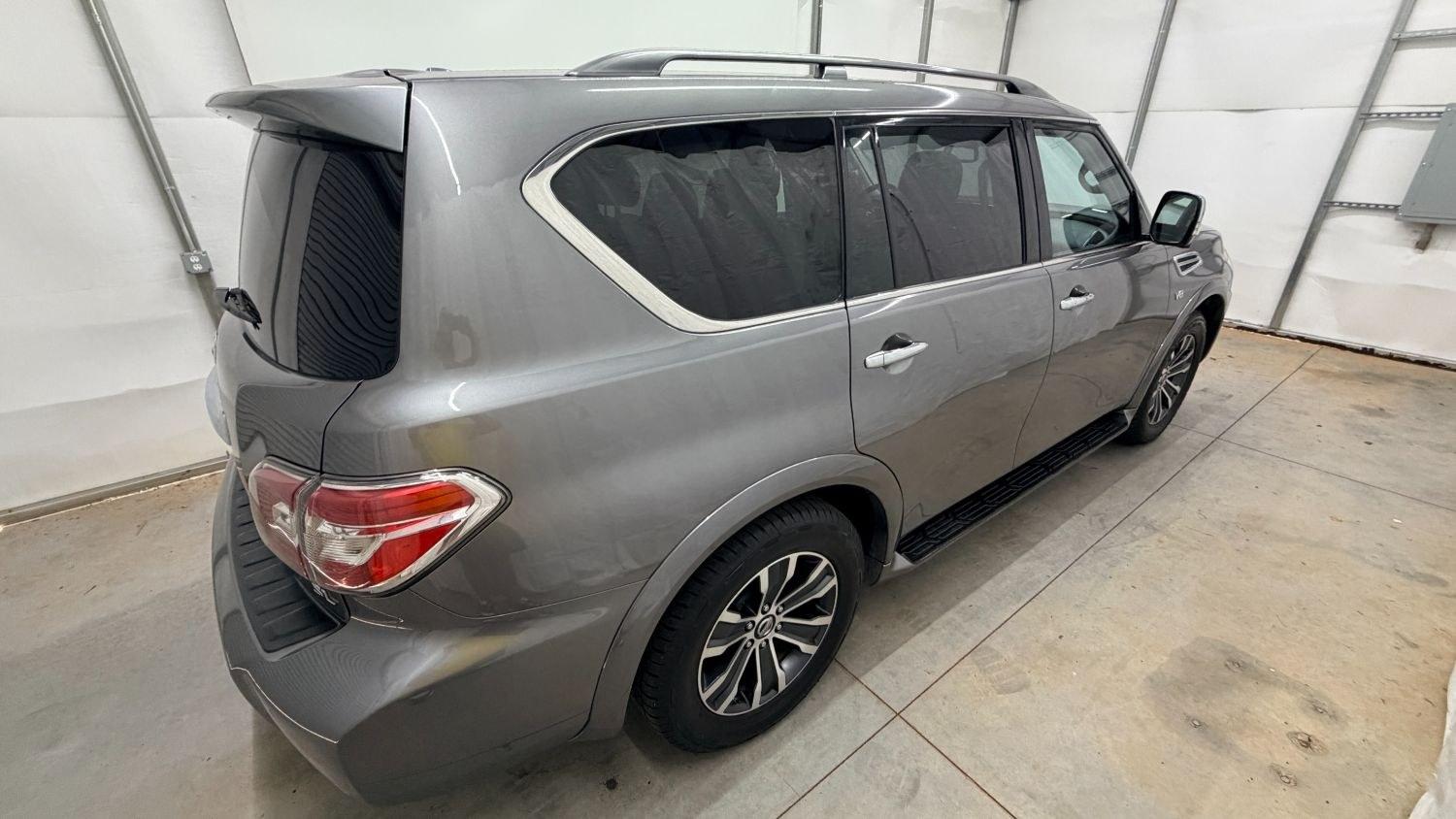 2020 Gray Nissan Armada SL 4WD (JN8AY2NC2LX) with an 5.6L V-8 gasoline direct injection engine, located at 1806 Veterans Memorial Hwy SW, Austell, GA, 30168, (770) 944-9558, 33.817959, -84.606987 - This 2020 Nissan Armada SL 4WD comes loaded with a powerful 390 hp 5.6L V8 engine and four-wheel drive, ready to handle everything from daily commutes to weekend trips with confidence. Inside, you'll find comfortable leather seating with heated seats, a navigation system, backup camera, adaptive cru- Photo#7