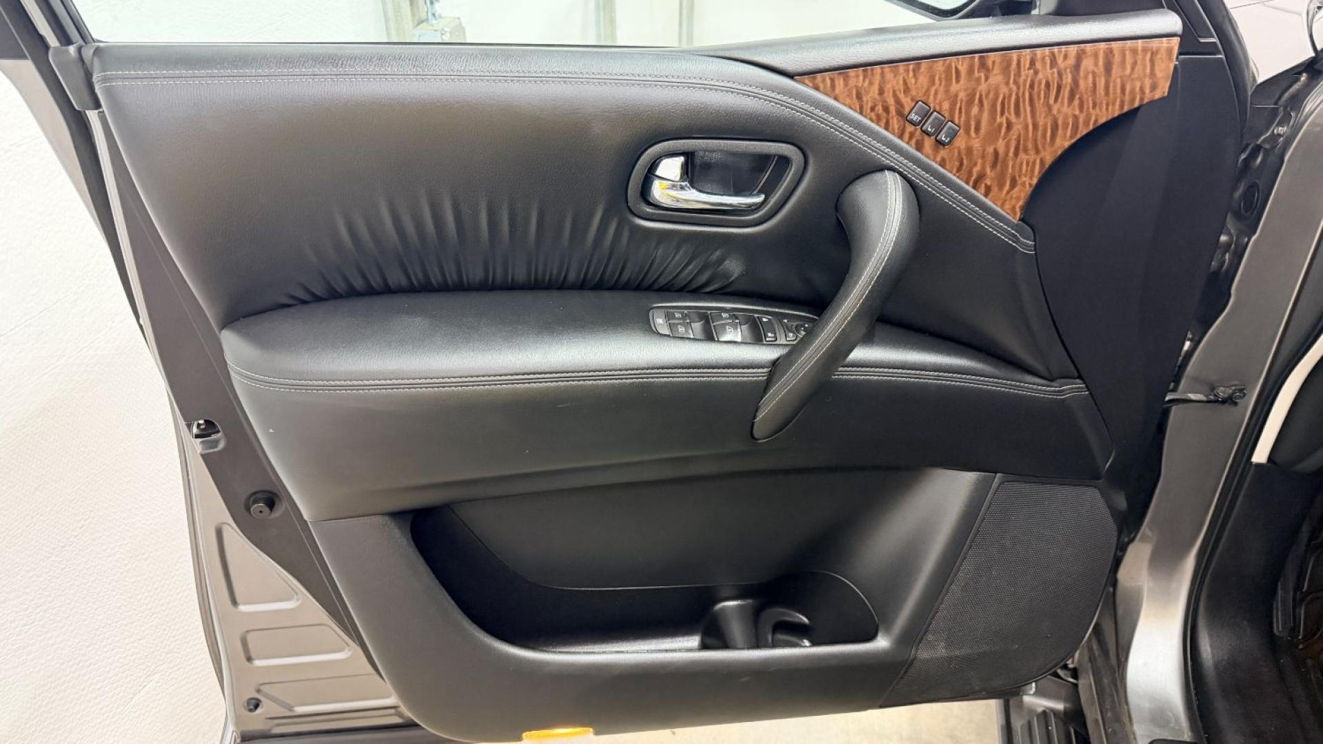 2020 Gray Nissan Armada SL 4WD (JN8AY2NC2LX) with an 5.6L V-8 gasoline direct injection engine, located at 1806 Veterans Memorial Hwy SW, Austell, GA, 30168, (770) 944-9558, 33.817959, -84.606987 - This 2020 Nissan Armada SL 4WD comes loaded with a powerful 390 hp 5.6L V8 engine and four-wheel drive, ready to handle everything from daily commutes to weekend trips with confidence. Inside, you'll find comfortable leather seating with heated seats, a navigation system, backup camera, adaptive cru- Photo#11