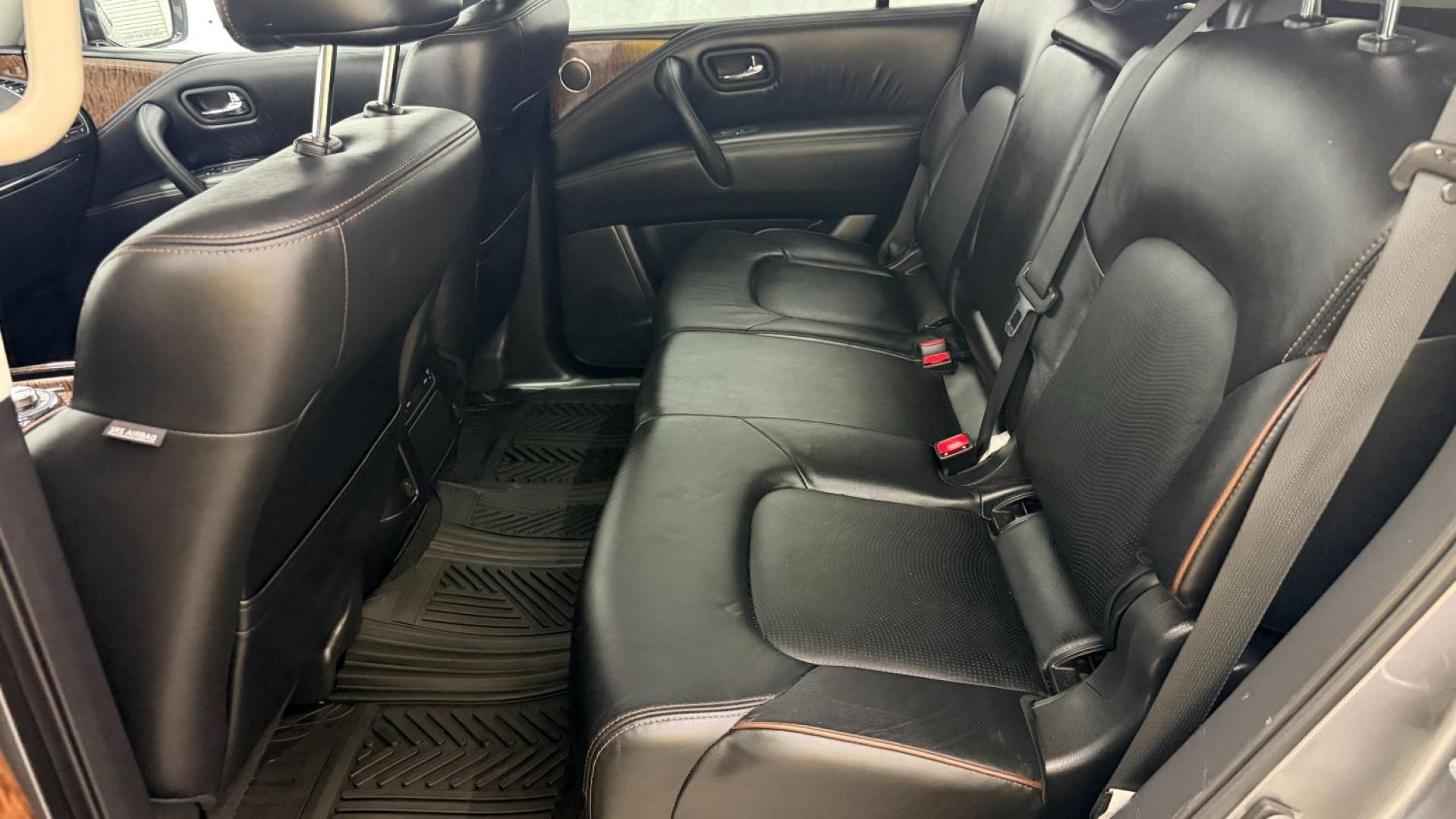 2020 Gray Nissan Armada SL 4WD (JN8AY2NC2LX) with an 5.6L V-8 gasoline direct injection engine, located at 1806 Veterans Memorial Hwy SW, Austell, GA, 30168, (770) 944-9558, 33.817959, -84.606987 - This 2020 Nissan Armada SL 4WD comes loaded with a powerful 390 hp 5.6L V8 engine and four-wheel drive, ready to handle everything from daily commutes to weekend trips with confidence. Inside, you'll find comfortable leather seating with heated seats, a navigation system, backup camera, adaptive cru- Photo#14