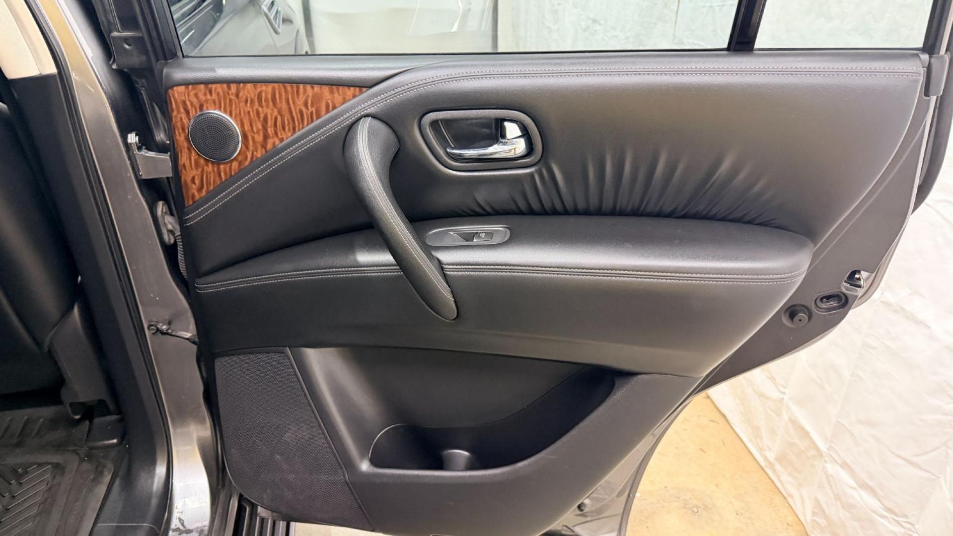 2020 Gray Nissan Armada SL 4WD (JN8AY2NC2LX) with an 5.6L V-8 gasoline direct injection engine, located at 1806 Veterans Memorial Hwy SW, Austell, GA, 30168, (770) 944-9558, 33.817959, -84.606987 - This 2020 Nissan Armada SL 4WD comes loaded with a powerful 390 hp 5.6L V8 engine and four-wheel drive, ready to handle everything from daily commutes to weekend trips with confidence. Inside, you'll find comfortable leather seating with heated seats, a navigation system, backup camera, adaptive cru- Photo#17