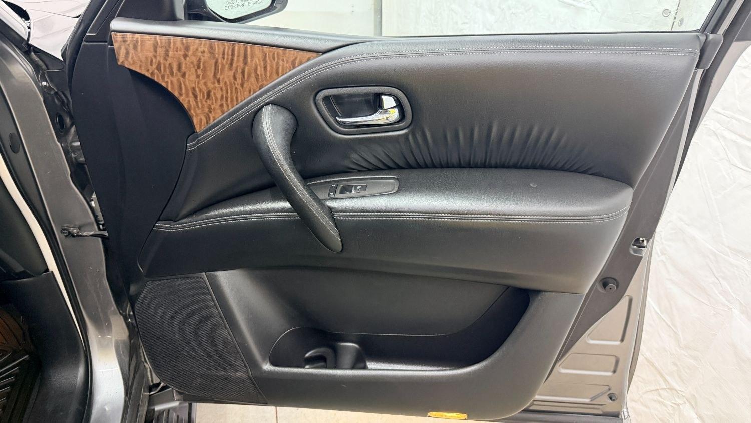 2020 Gray Nissan Armada SL 4WD (JN8AY2NC2LX) with an 5.6L V-8 gasoline direct injection engine, located at 1806 Veterans Memorial Hwy SW, Austell, GA, 30168, (770) 944-9558, 33.817959, -84.606987 - This 2020 Nissan Armada SL 4WD comes loaded with a powerful 390 hp 5.6L V8 engine and four-wheel drive, ready to handle everything from daily commutes to weekend trips with confidence. Inside, you'll find comfortable leather seating with heated seats, a navigation system, backup camera, adaptive cru- Photo#19