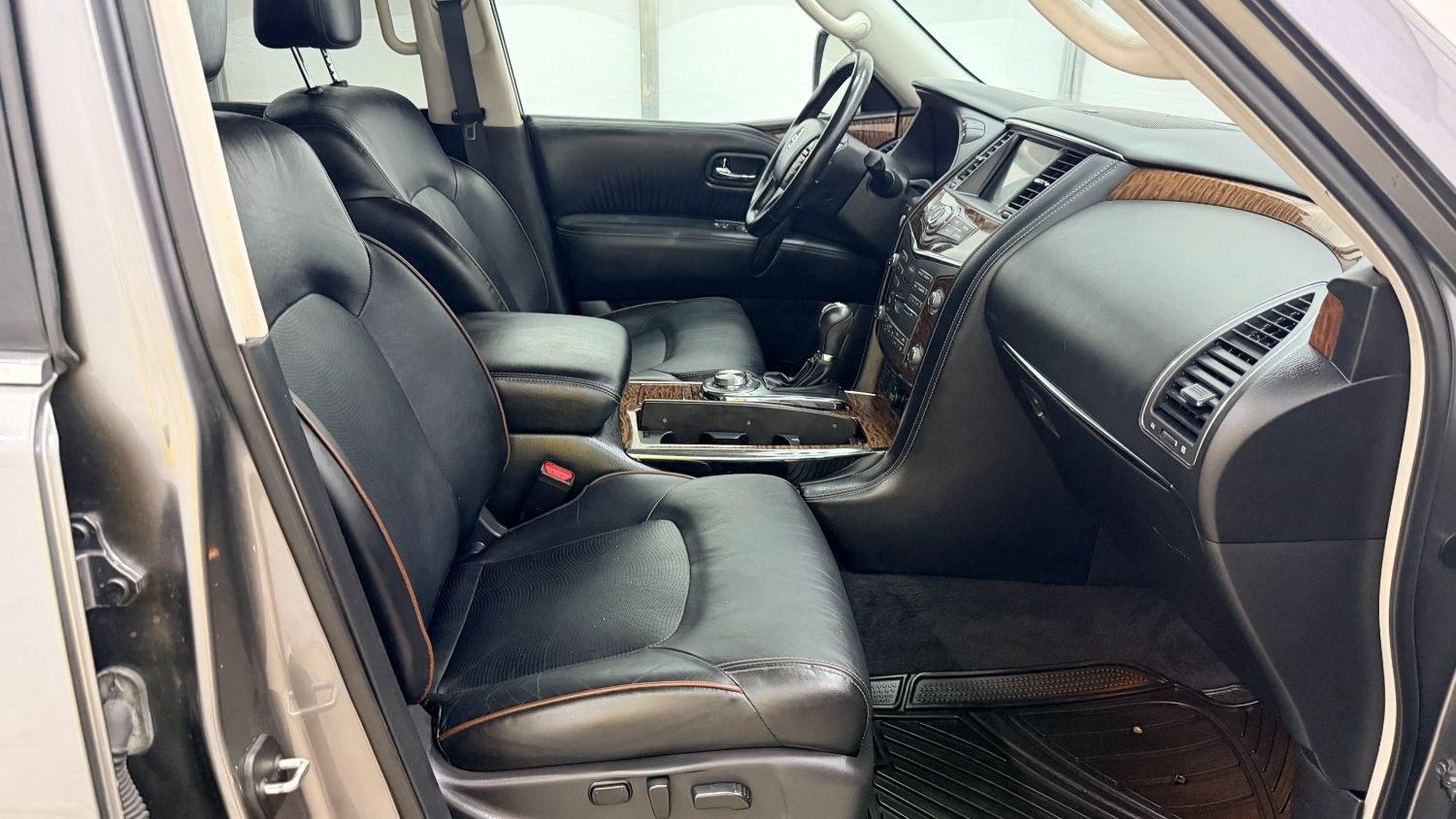 2020 Gray Nissan Armada SL 4WD (JN8AY2NC2LX) with an 5.6L V-8 gasoline direct injection engine, located at 1806 Veterans Memorial Hwy SW, Austell, GA, 30168, (770) 944-9558, 33.817959, -84.606987 - This 2020 Nissan Armada SL 4WD comes loaded with a powerful 390 hp 5.6L V8 engine and four-wheel drive, ready to handle everything from daily commutes to weekend trips with confidence. Inside, you'll find comfortable leather seating with heated seats, a navigation system, backup camera, adaptive cru- Photo#20