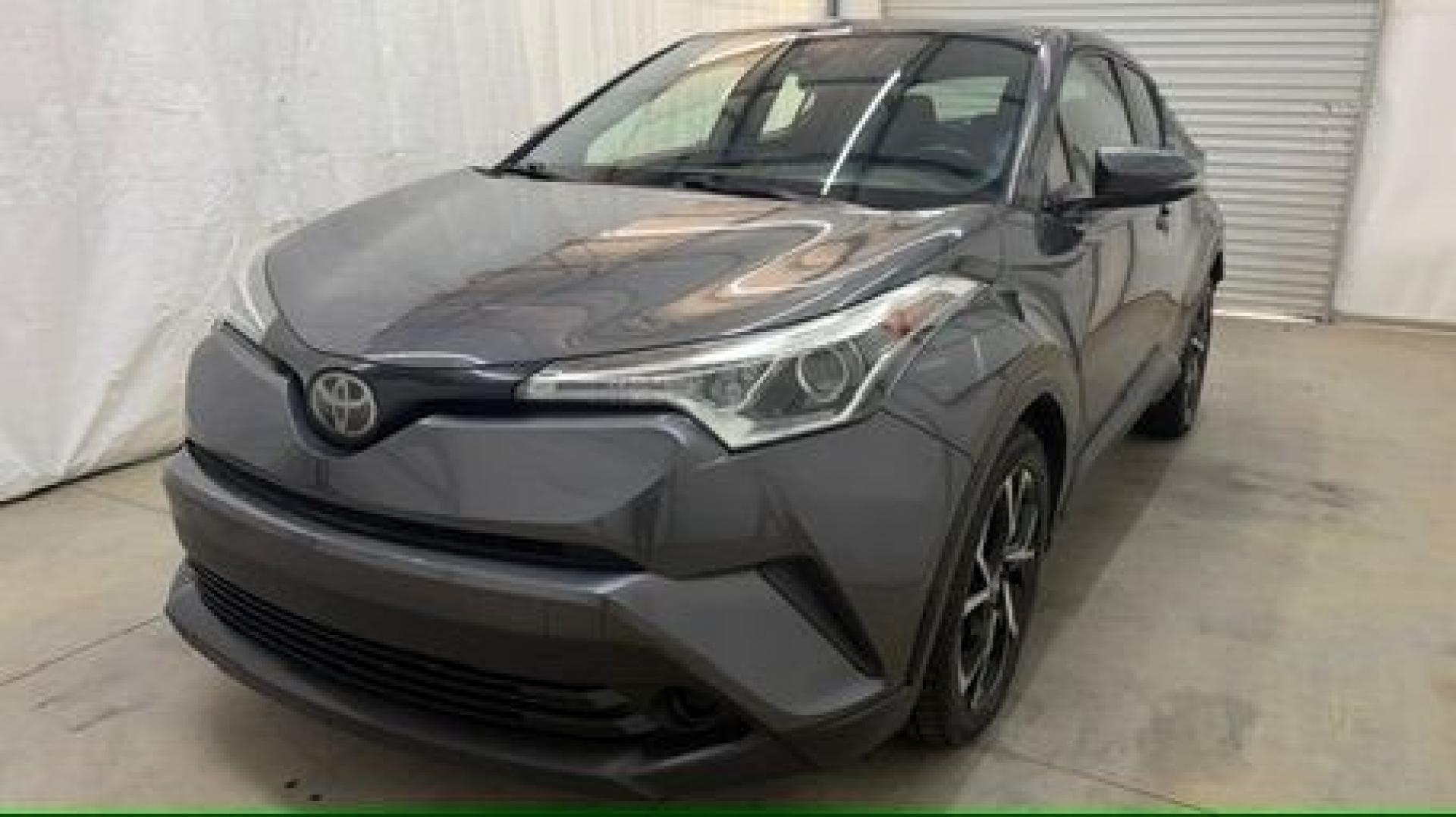2018 Gray Toyota C-HR XLE (NMTKHMBX5JR) with an 2L I-4 DOHC engine, located at 1806 Veterans Memorial Hwy SW, Austell, GA, 30168, (770) 944-9558, 33.817959, -84.606987 - This 2018 Toyota C-HR has passed a 100+ point inspection performed in our own service center. It's in impeccable condition, with no odors, and the seats are in very good shape. For extra peace of mind, the transmission bearings have been replaced, it should have hundreds of thousands of miles. Come- Photo#0