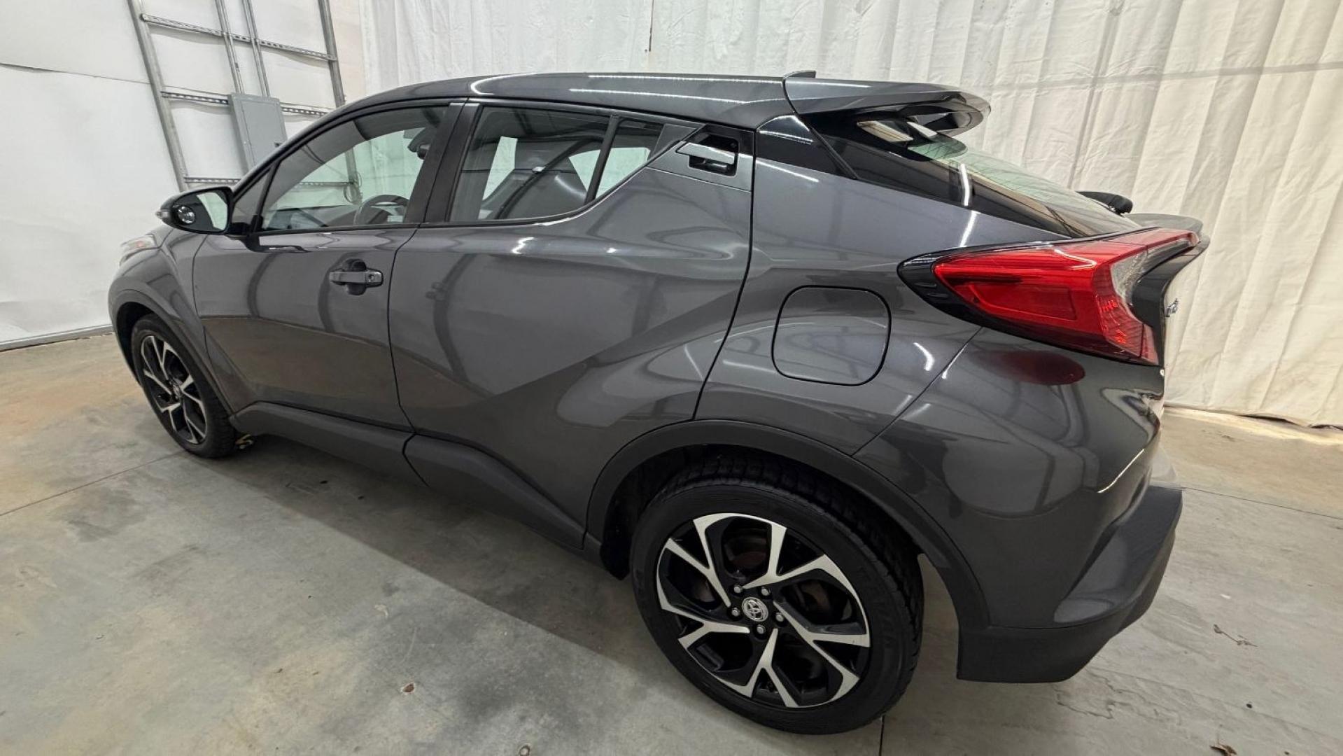 2018 Gray Toyota C-HR XLE (NMTKHMBX5JR) with an 2L I-4 DOHC engine, located at 1806 Veterans Memorial Hwy SW, Austell, GA, 30168, (770) 944-9558, 33.817959, -84.606987 - This 2018 Toyota C-HR has passed a 100+ point inspection performed in our own service center. It's in impeccable condition, with no odors, and the seats are in very good shape. For extra peace of mind, the transmission bearings have been replaced, it should have hundreds of thousands of miles. Come- Photo#2