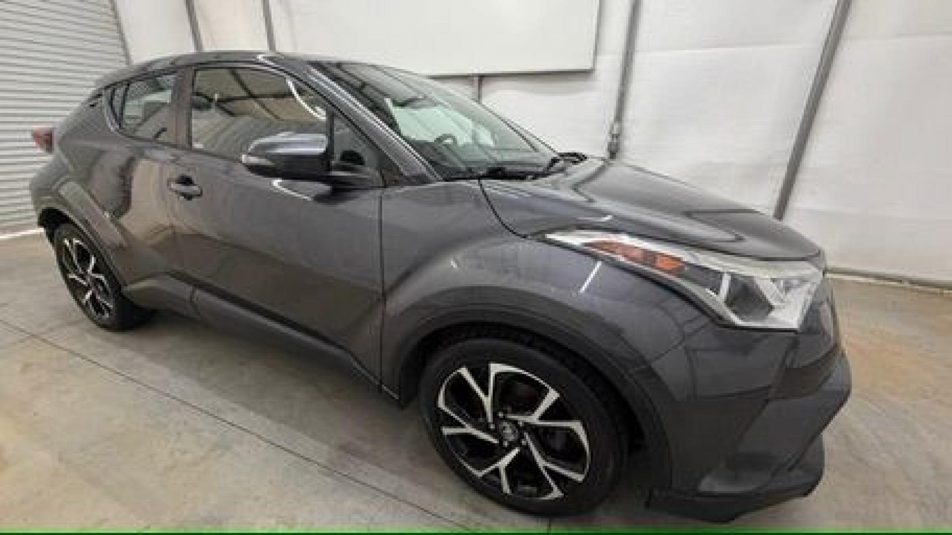 2018 Gray Toyota C-HR XLE (NMTKHMBX5JR) with an 2L I-4 DOHC engine, located at 1806 Veterans Memorial Hwy SW, Austell, GA, 30168, (770) 944-9558, 33.817959, -84.606987 - This 2018 Toyota C-HR has passed a 100+ point inspection performed in our own service center. It's in impeccable condition, with no odors, and the seats are in very good shape. For extra peace of mind, the transmission bearings have been replaced, it should have hundreds of thousands of miles. Come- Photo#7