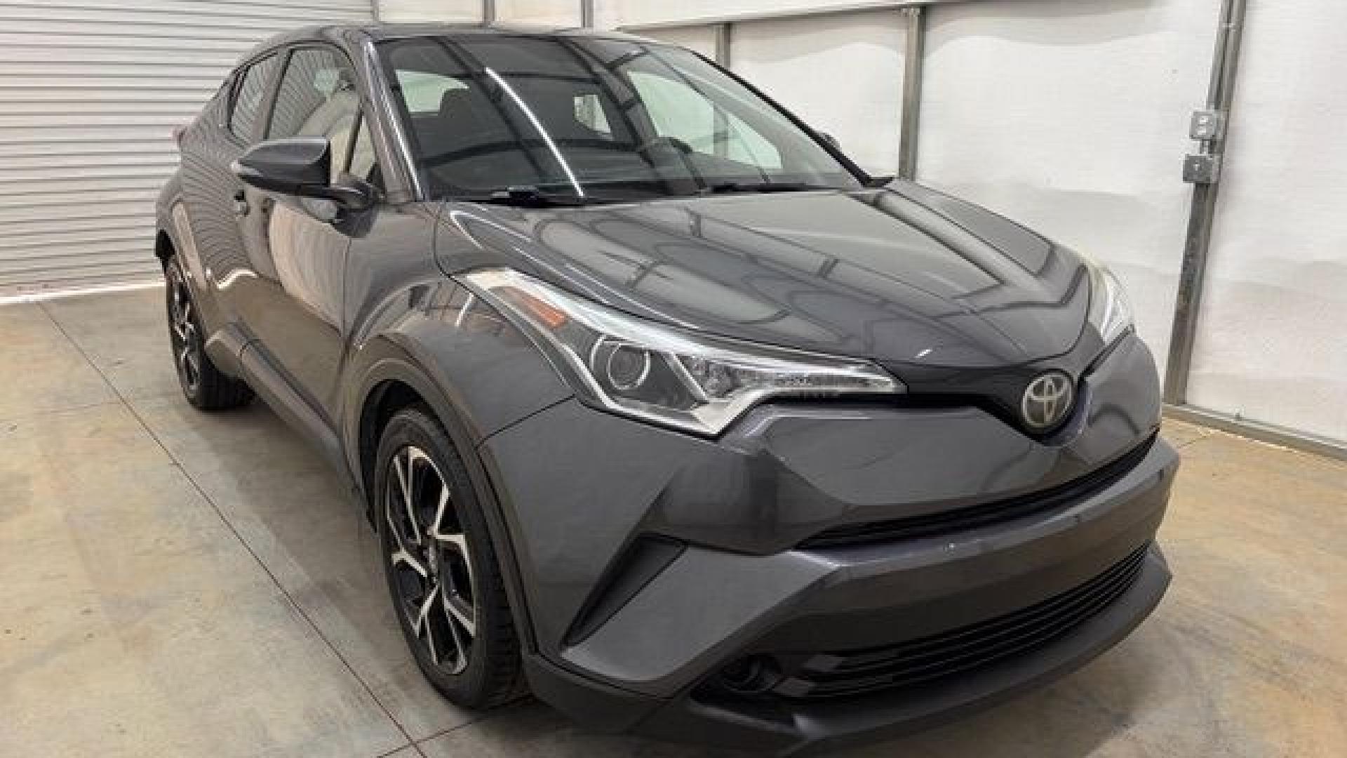 2018 Gray Toyota C-HR XLE (NMTKHMBX5JR) with an 2L I-4 DOHC engine, located at 1806 Veterans Memorial Hwy SW, Austell, GA, 30168, (770) 944-9558, 33.817959, -84.606987 - This 2018 Toyota C-HR has passed a 100+ point inspection performed in our own service center. It's in impeccable condition, with no odors, and the seats are in very good shape. For extra peace of mind, the transmission bearings have been replaced, it should have hundreds of thousands of miles. Come- Photo#8