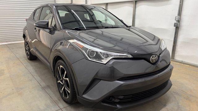 2018 Gray Toyota C-HR XLE (NMTKHMBX5JR) with an 2L I-4 DOHC engine, located at 1806 Veterans Memorial Hwy SW, Austell, GA, 30168, (770) 944-9558, 33.817959, -84.606987 - This 2018 Toyota C-HR has passed a 100+ point inspection performed in our own service center. It's in impeccable condition, with no odors, and the seats are in very good shape. For extra peace of mind, the transmission bearings have been replaced, it should have hundreds of thousands of miles. Come- Photo#8