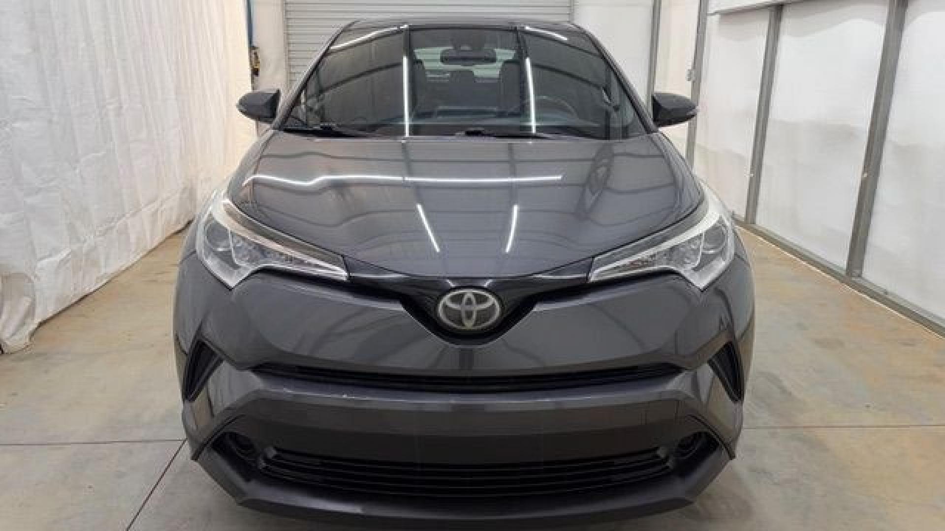 2018 Gray Toyota C-HR XLE (NMTKHMBX5JR) with an 2L I-4 DOHC engine, located at 1806 Veterans Memorial Hwy SW, Austell, GA, 30168, (770) 944-9558, 33.817959, -84.606987 - This 2018 Toyota C-HR has passed a 100+ point inspection performed in our own service center. It's in impeccable condition, with no odors, and the seats are in very good shape. For extra peace of mind, the transmission bearings have been replaced, it should have hundreds of thousands of miles. Come- Photo#9