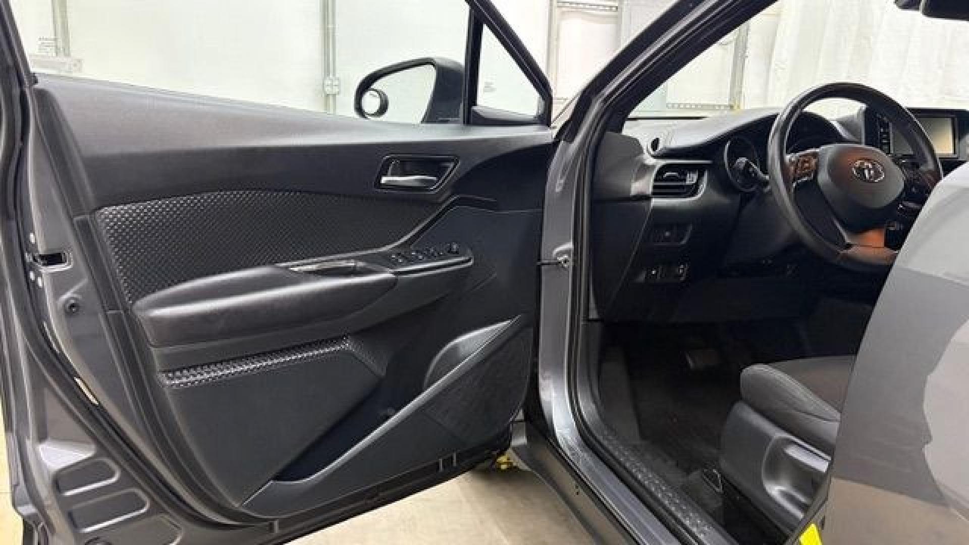 2018 Gray Toyota C-HR XLE (NMTKHMBX5JR) with an 2L I-4 DOHC engine, located at 1806 Veterans Memorial Hwy SW, Austell, GA, 30168, (770) 944-9558, 33.817959, -84.606987 - This 2018 Toyota C-HR has passed a 100+ point inspection performed in our own service center. It's in impeccable condition, with no odors, and the seats are in very good shape. For extra peace of mind, the transmission bearings have been replaced, it should have hundreds of thousands of miles. Come- Photo#10