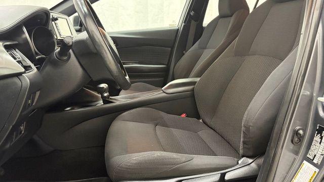 2018 Gray Toyota C-HR XLE (NMTKHMBX5JR) with an 2L I-4 DOHC engine, located at 1806 Veterans Memorial Hwy SW, Austell, GA, 30168, (770) 944-9558, 33.817959, -84.606987 - This 2018 Toyota C-HR has passed a 100+ point inspection performed in our own service center. It's in impeccable condition, with no odors, and the seats are in very good shape. For extra peace of mind, the transmission bearings have been replaced, it should have hundreds of thousands of miles. Come- Photo#11