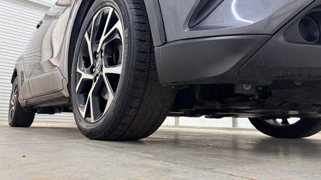 2018 Gray Toyota C-HR XLE (NMTKHMBX5JR) with an 2L I-4 DOHC engine, located at 1806 Veterans Memorial Hwy SW, Austell, GA, 30168, (770) 944-9558, 33.817959, -84.606987 - This 2018 Toyota C-HR has passed a 100+ point inspection performed in our own service center. It's in impeccable condition, with no odors, and the seats are in very good shape. For extra peace of mind, the transmission bearings have been replaced, it should have hundreds of thousands of miles. Come- Photo#19