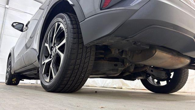 2018 Gray Toyota C-HR XLE (NMTKHMBX5JR) with an 2L I-4 DOHC engine, located at 1806 Veterans Memorial Hwy SW, Austell, GA, 30168, (770) 944-9558, 33.817959, -84.606987 - This 2018 Toyota C-HR has passed a 100+ point inspection performed in our own service center. It's in impeccable condition, with no odors, and the seats are in very good shape. For extra peace of mind, the transmission bearings have been replaced, it should have hundreds of thousands of miles. Come- Photo#21