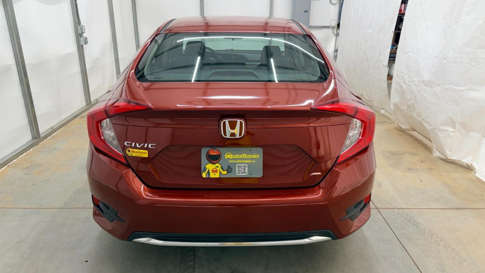 2021 Red Honda Civic Sedan LX (2HGFC2F64MH) with an 2L I-4 DOHC engine, located at 1806 Veterans Memorial Hwy SW, Austell, GA, 30168, (770) 944-9558, 33.817959, -84.606987 - This Honda is in great condition, with paint that looks good and tires that look clean and brand new. Inside, the interior looks impeccable. A reliable, fuel-efficient compact that's ready for daily driving.- Photo#4