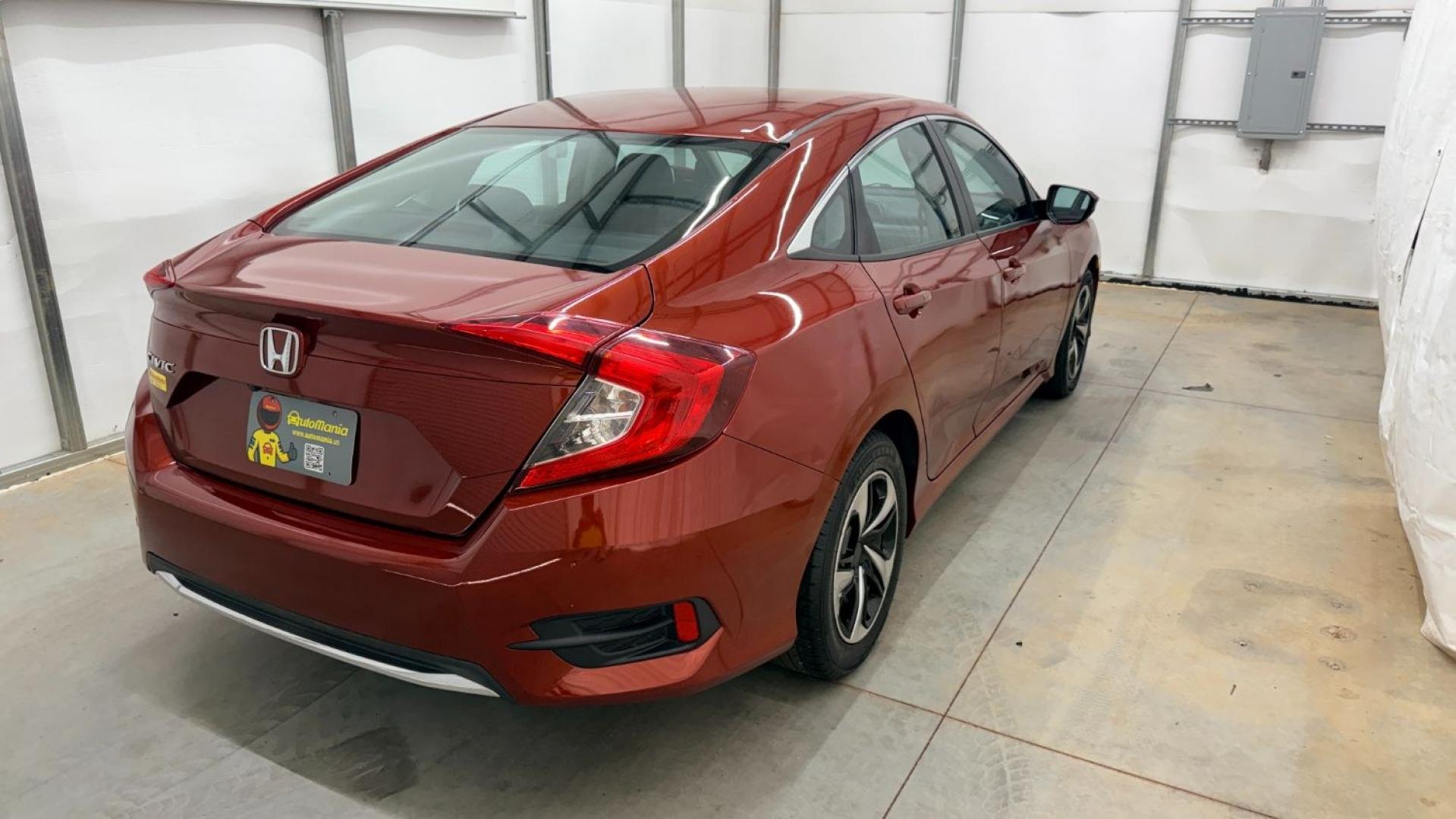 2021 Red Honda Civic Sedan LX (2HGFC2F64MH) with an 2L I-4 DOHC engine, located at 1806 Veterans Memorial Hwy SW, Austell, GA, 30168, (770) 944-9558, 33.817959, -84.606987 - This Honda is in great condition, with paint that looks good and tires that look clean and brand new. Inside, the interior looks impeccable. A reliable, fuel-efficient compact that's ready for daily driving.- Photo#5