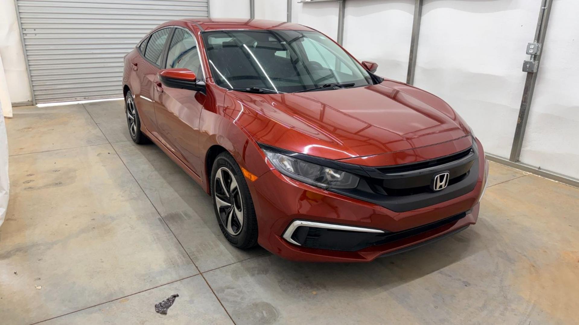 2021 Red Honda Civic Sedan LX (2HGFC2F64MH) with an 2L I-4 DOHC engine, located at 1806 Veterans Memorial Hwy SW, Austell, GA, 30168, (770) 944-9558, 33.817959, -84.606987 - This Honda is in great condition, with paint that looks good and tires that look clean and brand new. Inside, the interior looks impeccable. A reliable, fuel-efficient compact that's ready for daily driving.- Photo#8