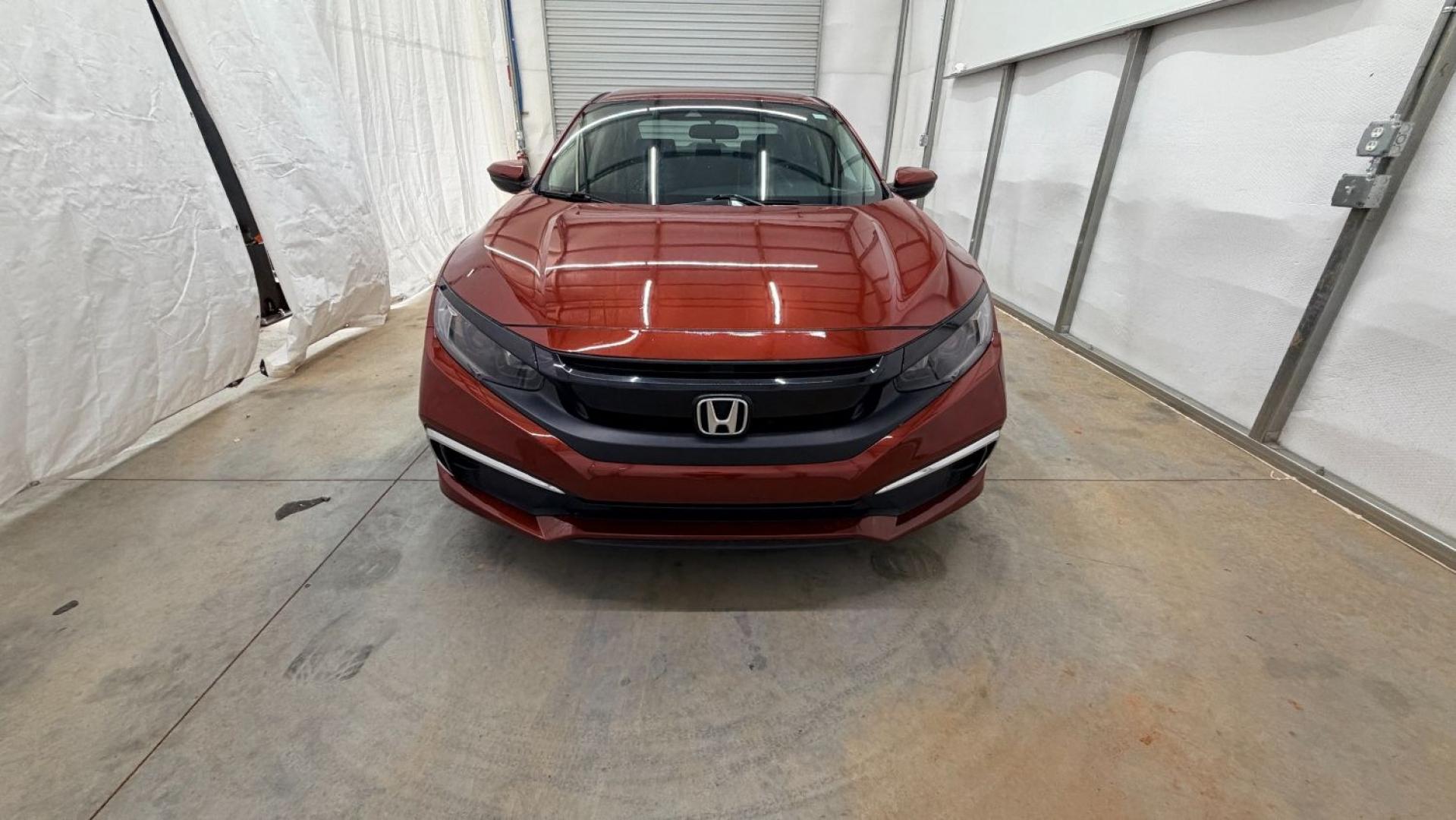 2021 Red Honda Civic Sedan LX (2HGFC2F64MH) with an 2L I-4 DOHC engine, located at 1806 Veterans Memorial Hwy SW, Austell, GA, 30168, (770) 944-9558, 33.817959, -84.606987 - This Honda is in great condition, with paint that looks good and tires that look clean and brand new. Inside, the interior looks impeccable. A reliable, fuel-efficient compact that's ready for daily driving.- Photo#9