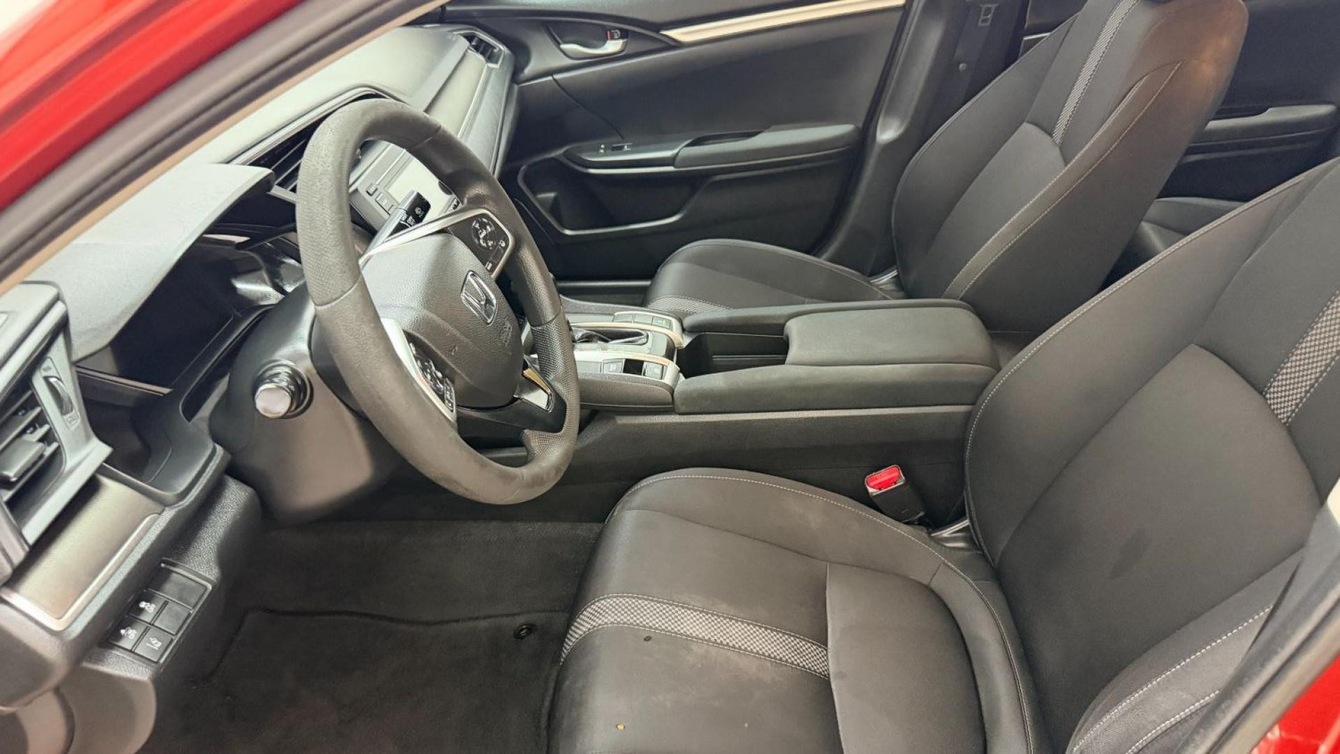 2021 Red Honda Civic Sedan LX (2HGFC2F64MH) with an 2L I-4 DOHC engine, located at 1806 Veterans Memorial Hwy SW, Austell, GA, 30168, (770) 944-9558, 33.817959, -84.606987 - This Honda is in great condition, with paint that looks good and tires that look clean and brand new. Inside, the interior looks impeccable. A reliable, fuel-efficient compact that's ready for daily driving.- Photo#11