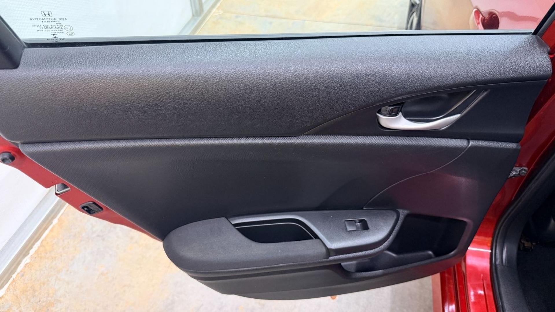 2021 Red Honda Civic Sedan LX (2HGFC2F64MH) with an 2L I-4 DOHC engine, located at 1806 Veterans Memorial Hwy SW, Austell, GA, 30168, (770) 944-9558, 33.817959, -84.606987 - This Honda is in great condition, with paint that looks good and tires that look clean and brand new. Inside, the interior looks impeccable. A reliable, fuel-efficient compact that's ready for daily driving.- Photo#12