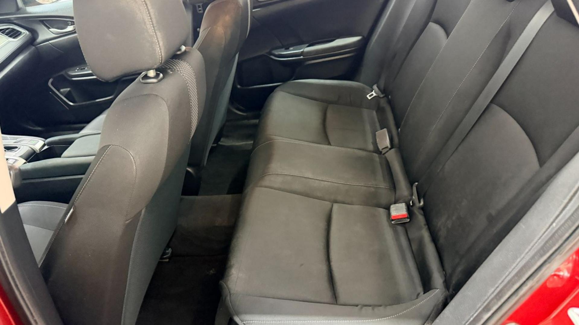 2021 Red Honda Civic Sedan LX (2HGFC2F64MH) with an 2L I-4 DOHC engine, located at 1806 Veterans Memorial Hwy SW, Austell, GA, 30168, (770) 944-9558, 33.817959, -84.606987 - This Honda is in great condition, with paint that looks good and tires that look clean and brand new. Inside, the interior looks impeccable. A reliable, fuel-efficient compact that's ready for daily driving.- Photo#13